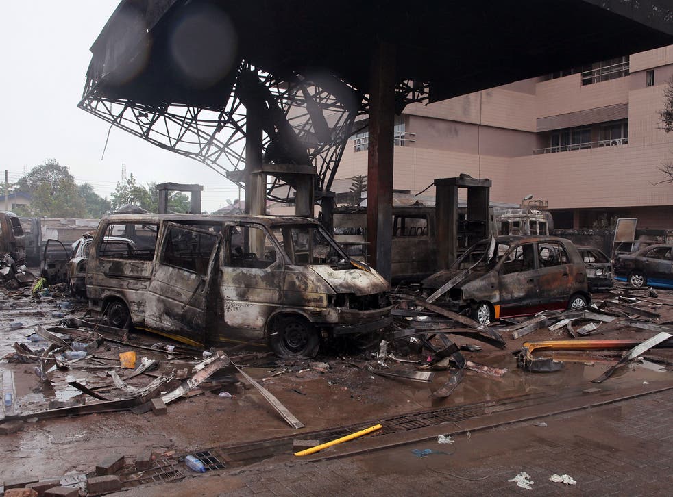 The remaining structure of a gas station after it exploded in Accra, Ghana