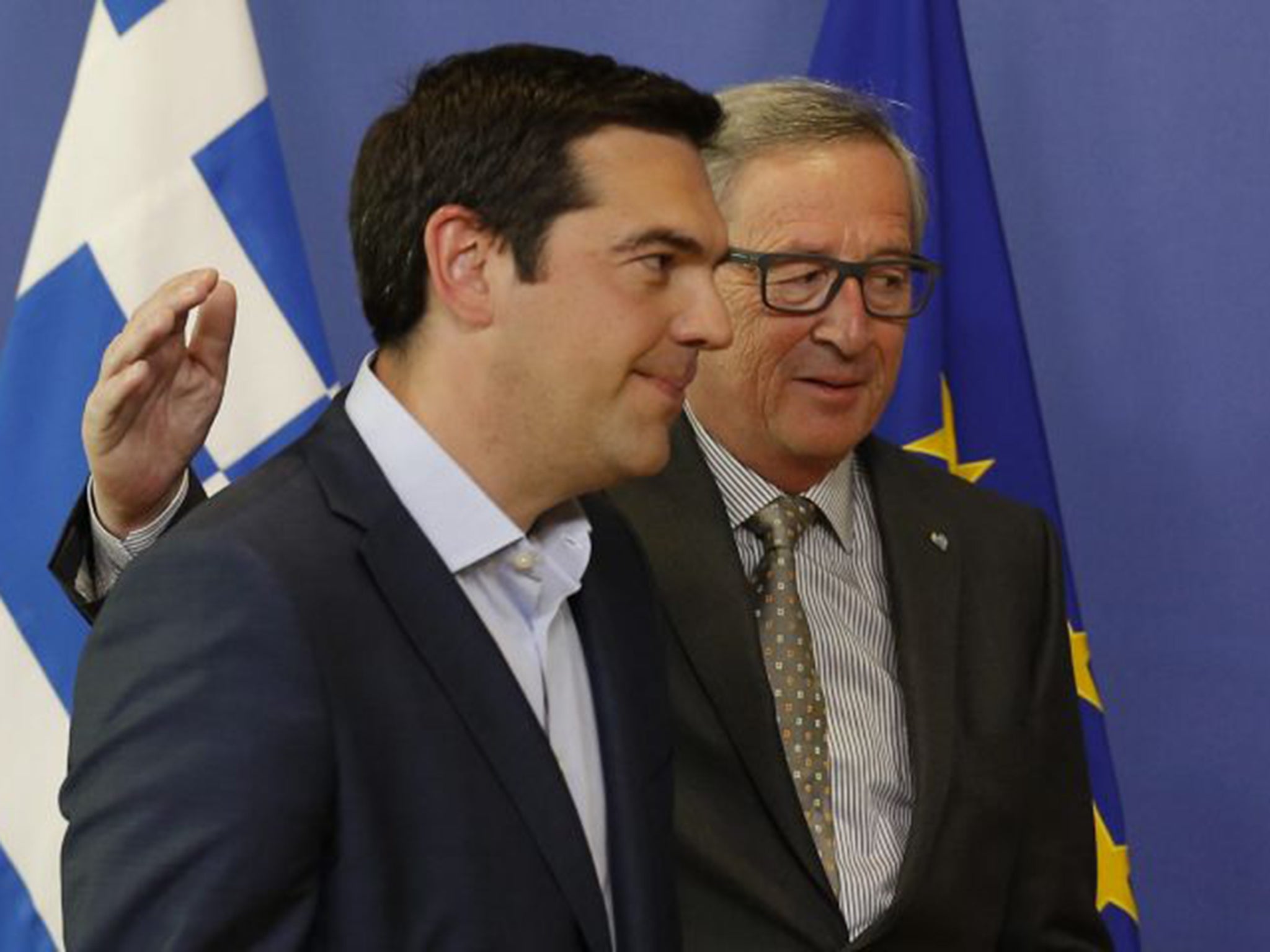 Alexis Tsipras and Jean-Claude Juncker, the head of the European Commission