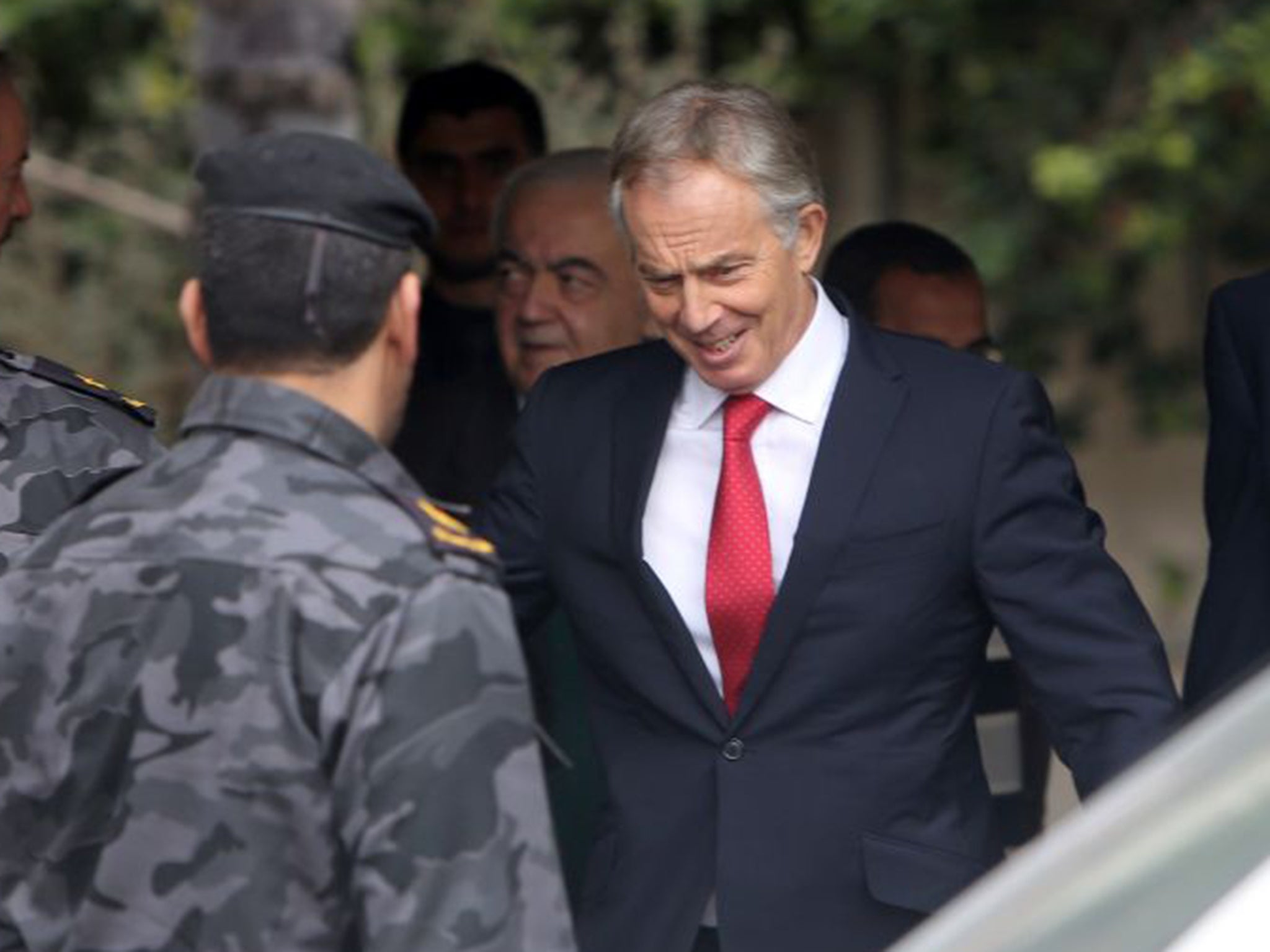 Former Middle East Quartet envoy Tony Blair leaving after a meeting with Palestinian unity government ministers in Gaza city in February