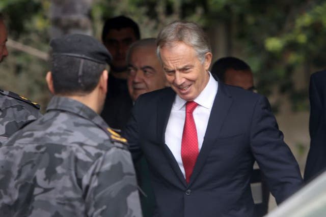 Former Middle East Quartet envoy Tony Blair leaving after a meeting with Palestinian unity government ministers in Gaza city in February