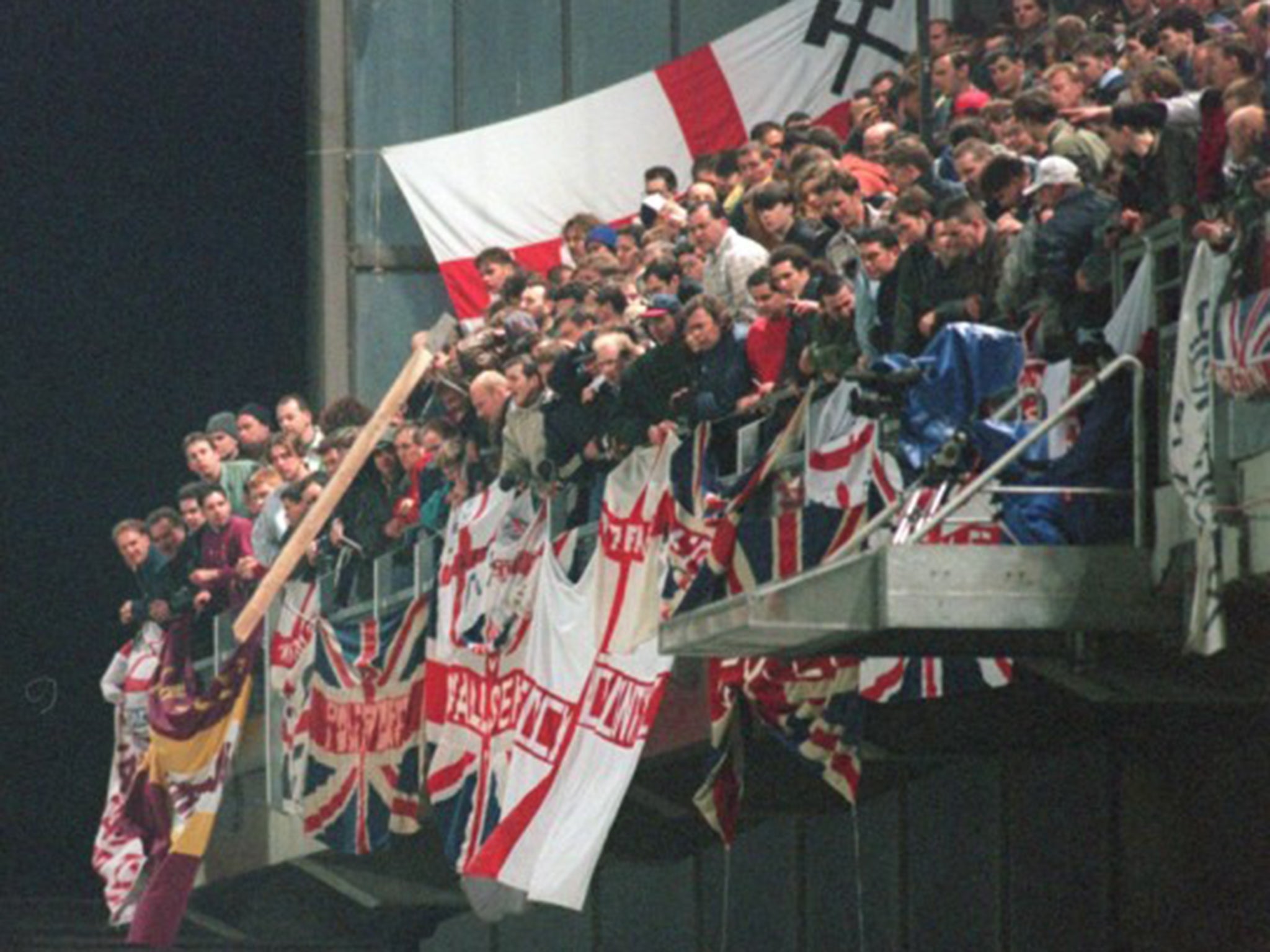 England fans in the upper tier of the West Stand hurl missiles