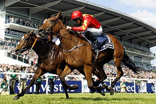 Qualify (right) snatches victory from Legatissimo by a short-head in the Oaks at Epsom