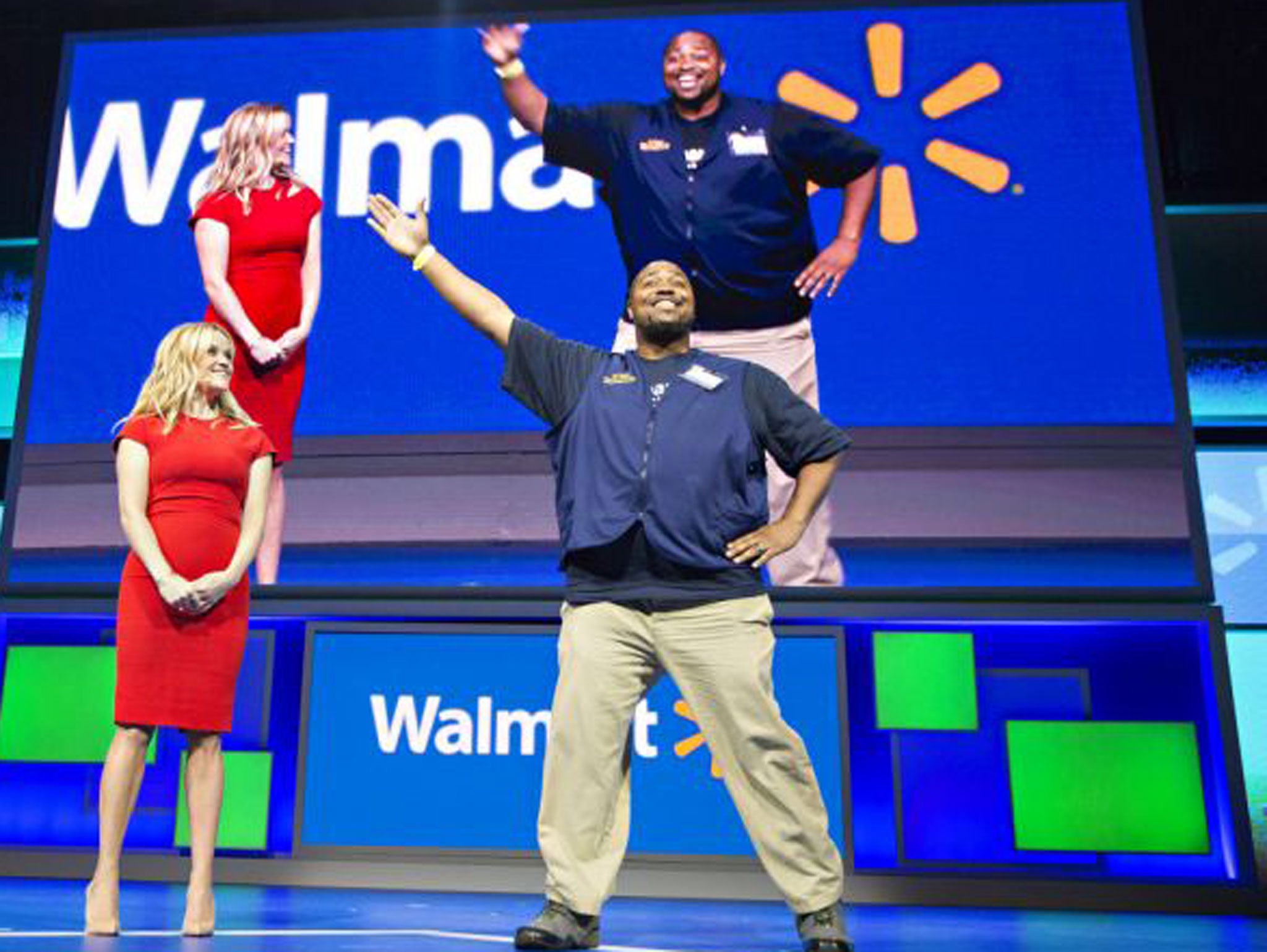 Reese Witherspoon and Mr Rollback at Walmart's annual meeting 2015