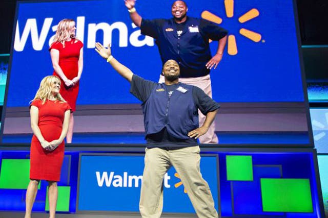 Reese Witherspoon and Mr Rollback at Walmart's annual meeting 2015