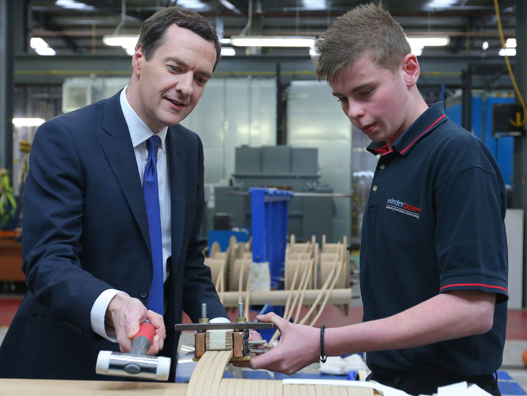 The Chancellor, George Osborne, meets apprentice Jordan Hankin during a visit to Winder Power in May, 2015