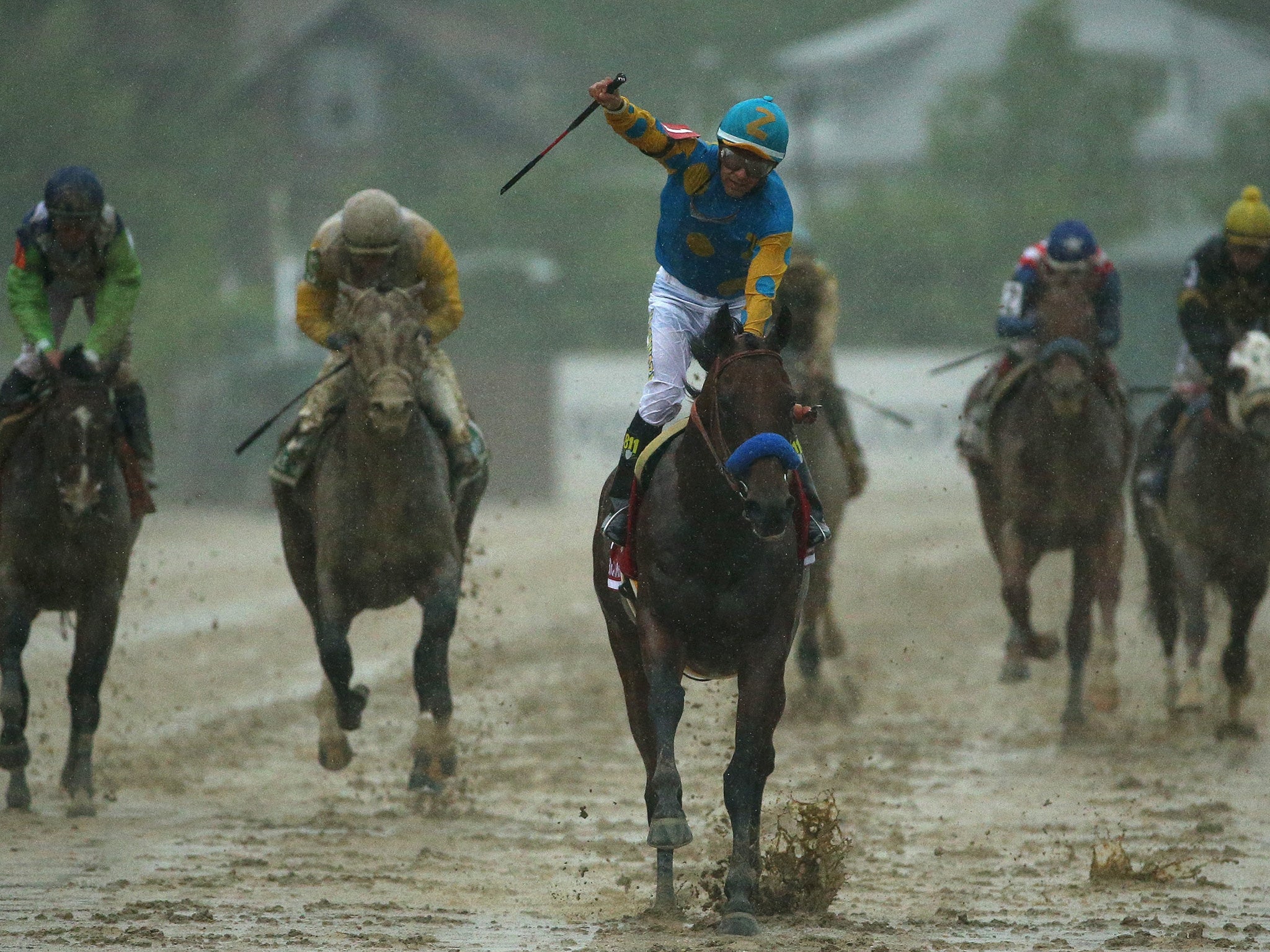 American Pharoah clinches Preakness in treacherous conditions (Getty)