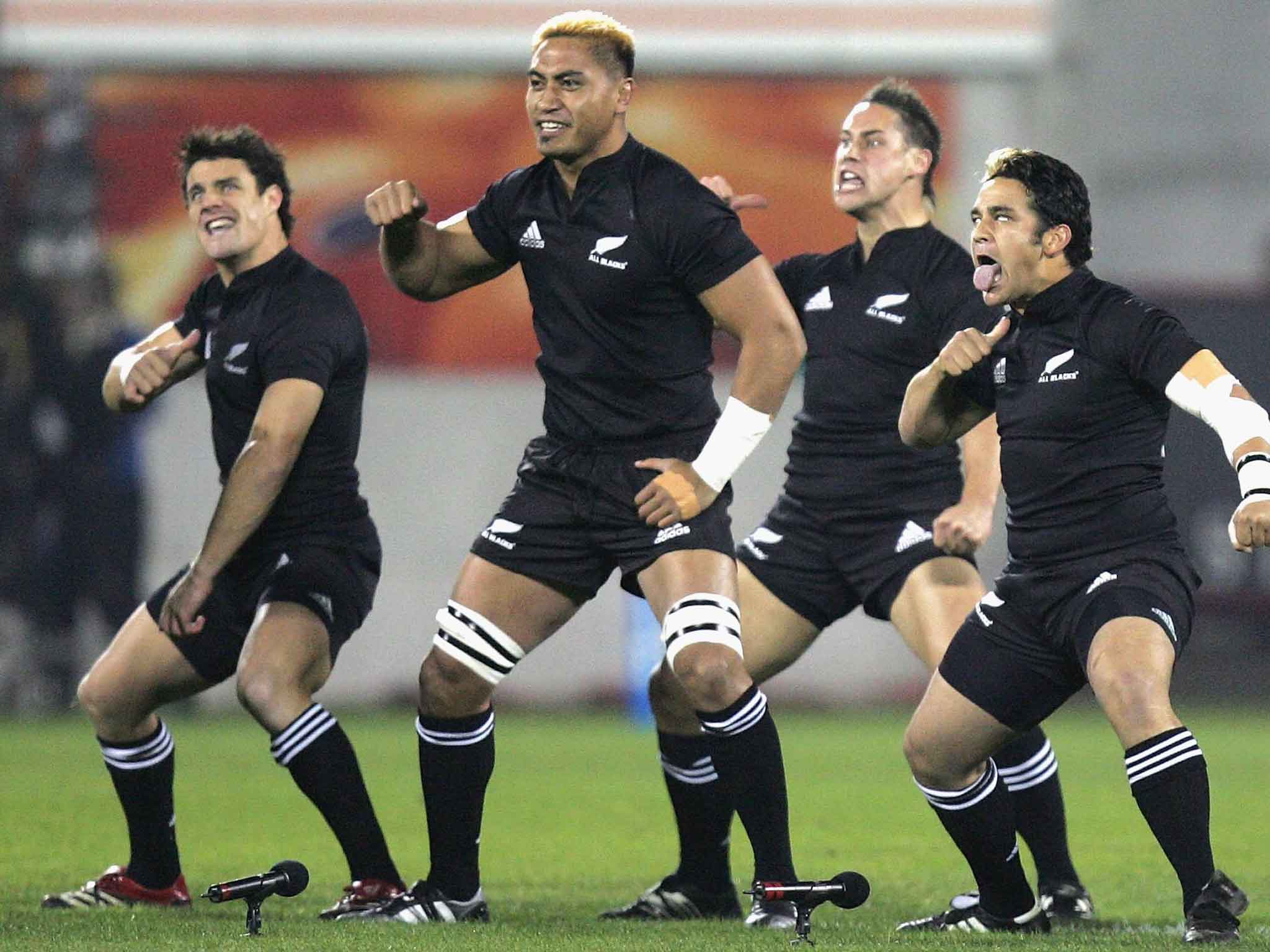 Collins performing the Haka with his New Zealand team-mates