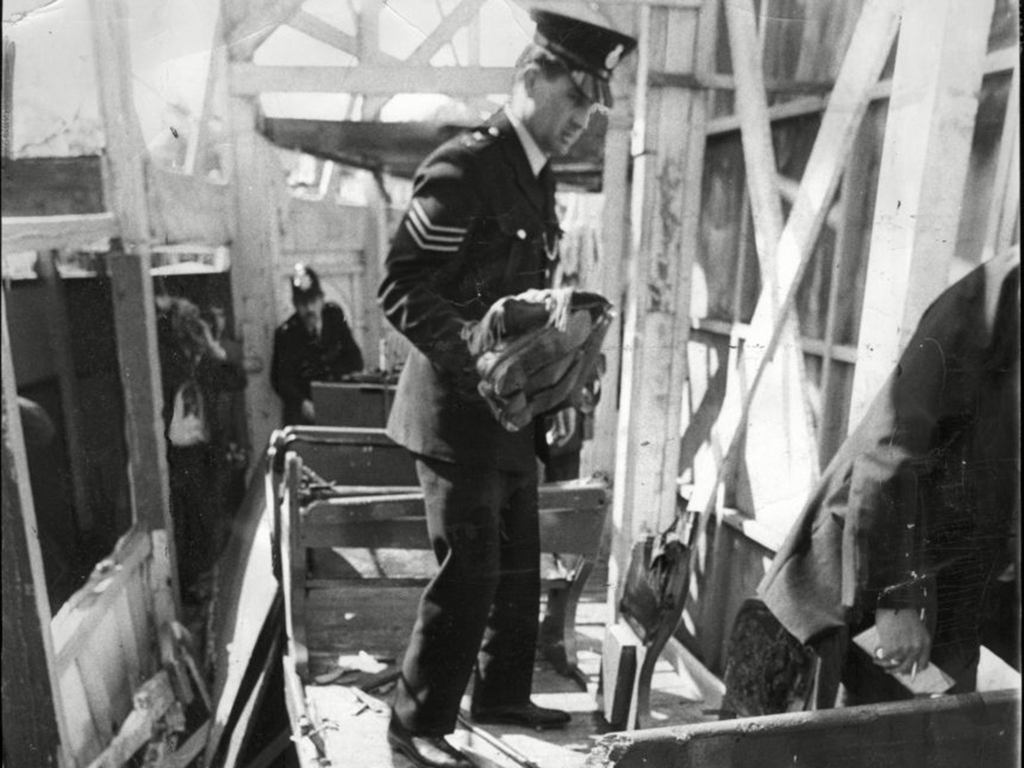 Police examine the track after the 1972 crash (Rex)