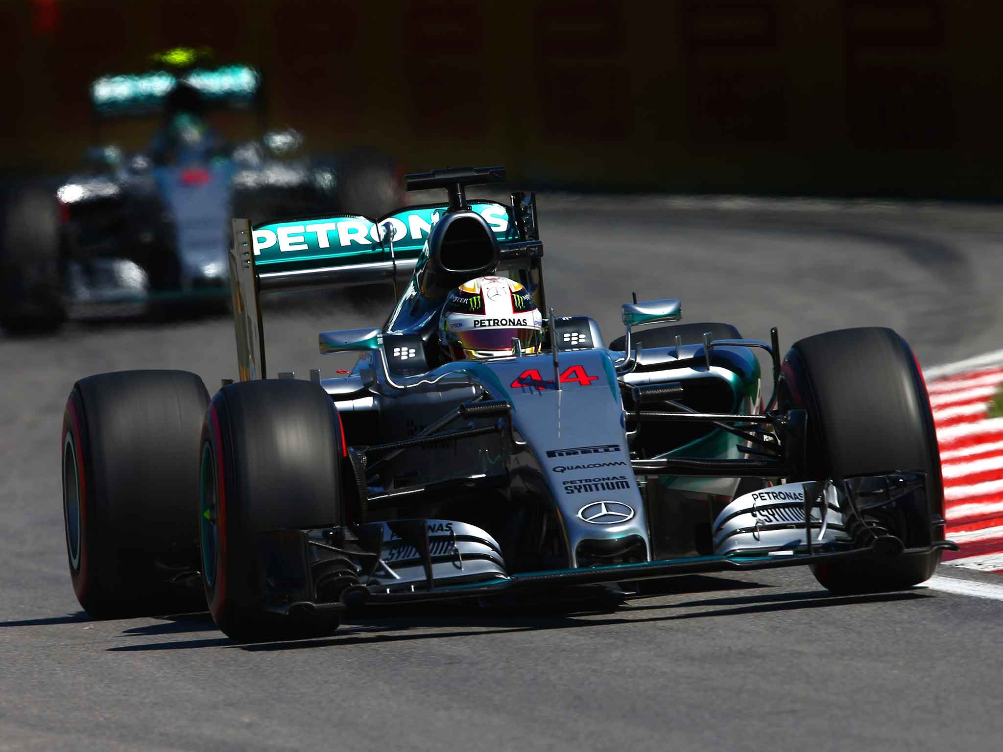 Lewis Hamilton leads Nico Rosberg during qualifying