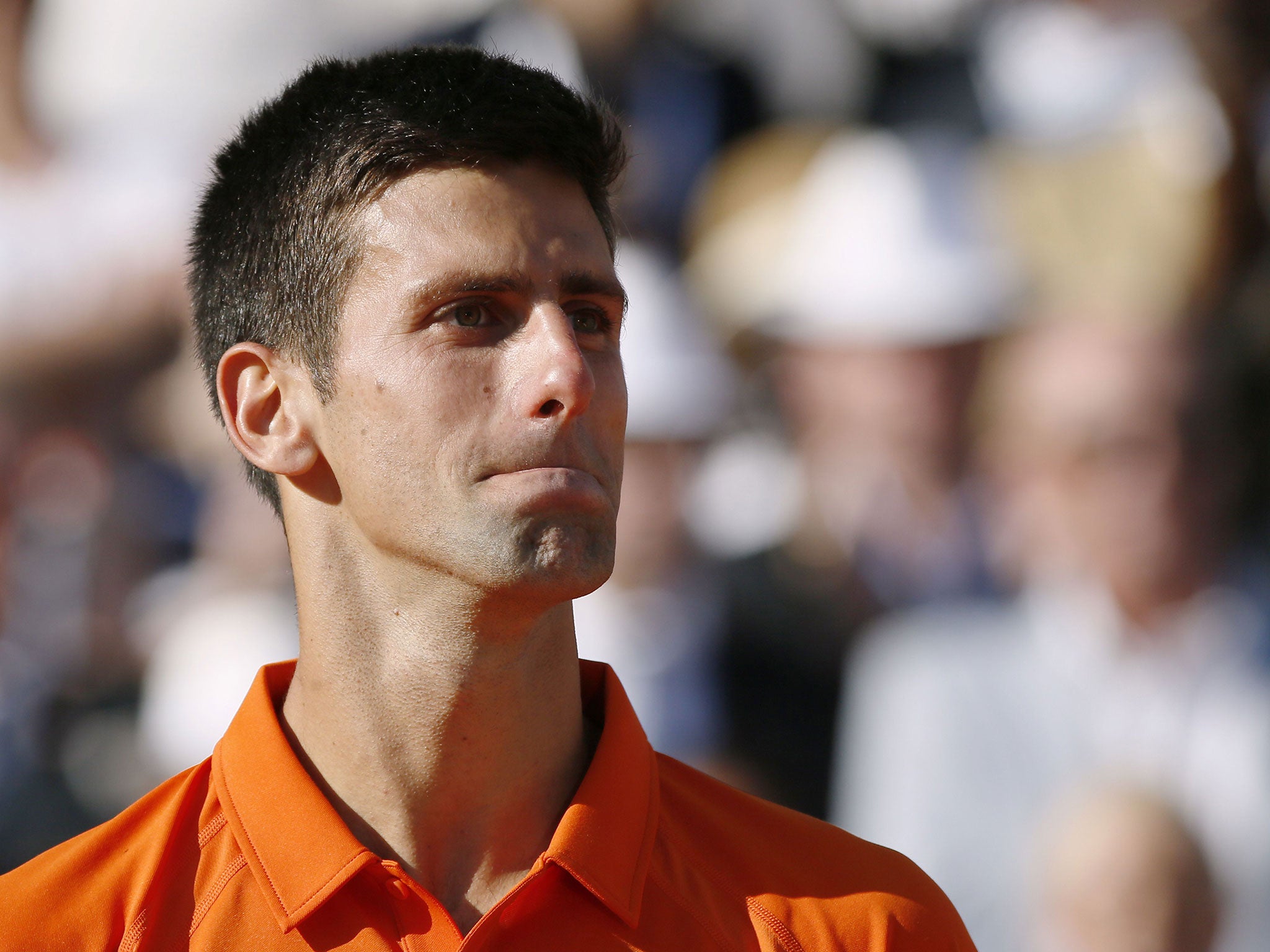 Novak Djokovic was nearly brought to tears after an ovation from the crowd despite defeat