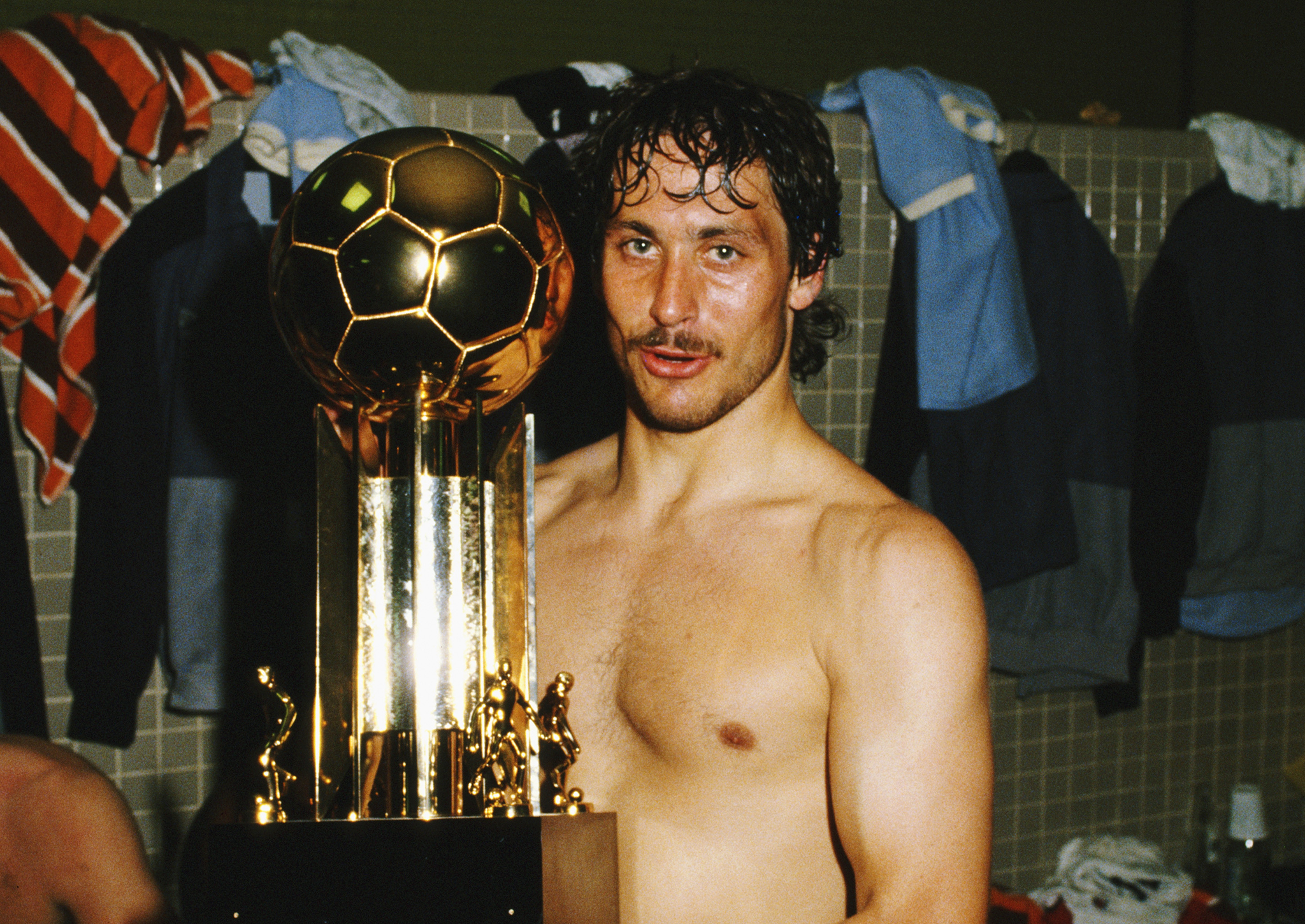 England defender Kenny Sansom pictured in the dressing room with the trophy after a 2-0 win over Brazil at the Maracana on June 10, 1984 in Rio de Janeiro, Brazil