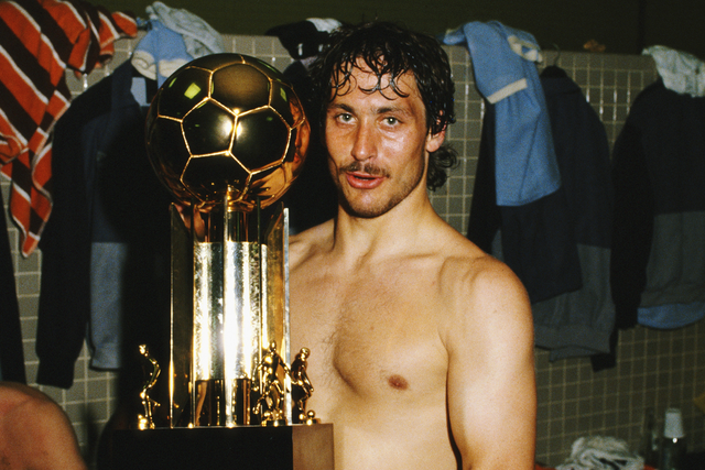 England defender Kenny Sansom pictured in the dressing room with the trophy after a 2-0 win over Brazil at the Maracana on June 10, 1984 in Rio de Janeiro, Brazil