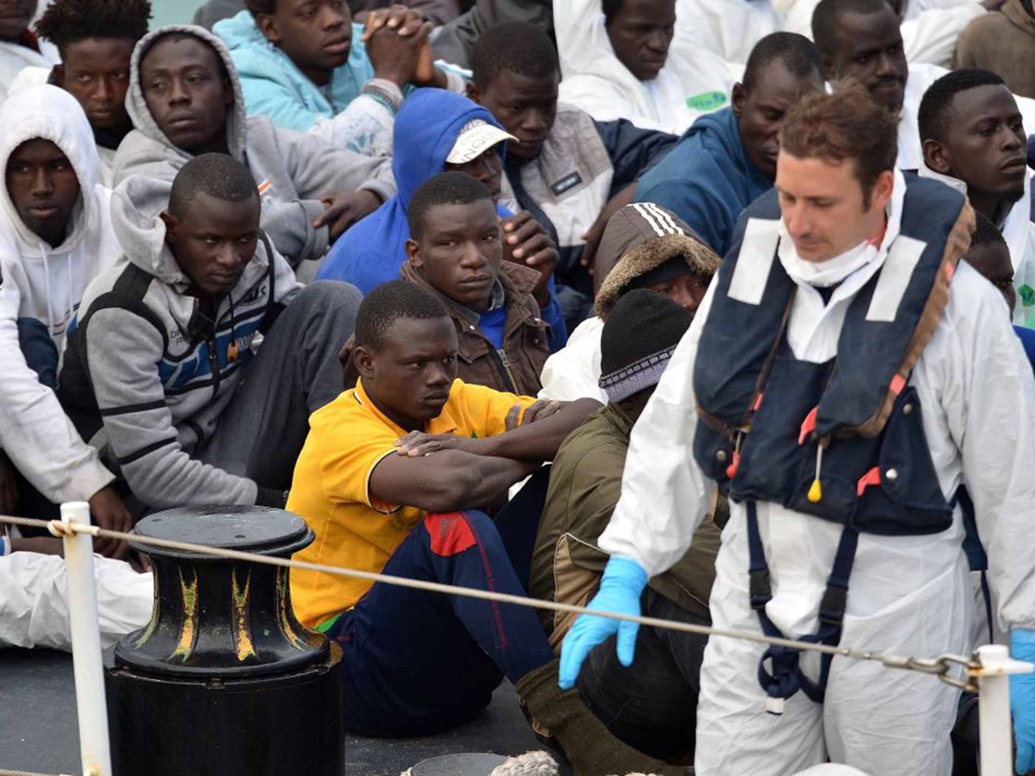 Italian press is reporting that coaches are being readied to transfer over 3,000 migrants inland (AFP/Getty)