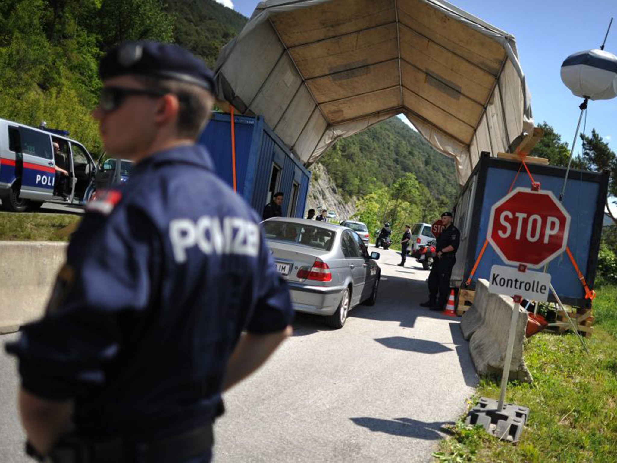 Police check cars in the Alps in the build-up to the Bilderberg conference