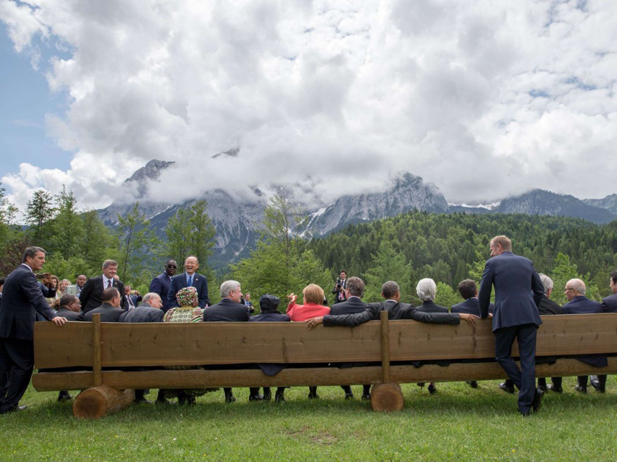 World leaders (including Barack Obama with David Cameron and Angela Merkel to his left, and head of the IMF Christine Lagarde and Italian PM Matteo Renzi to his right) take a break from yesterday’s G7 meetings in Bavaria on Monday