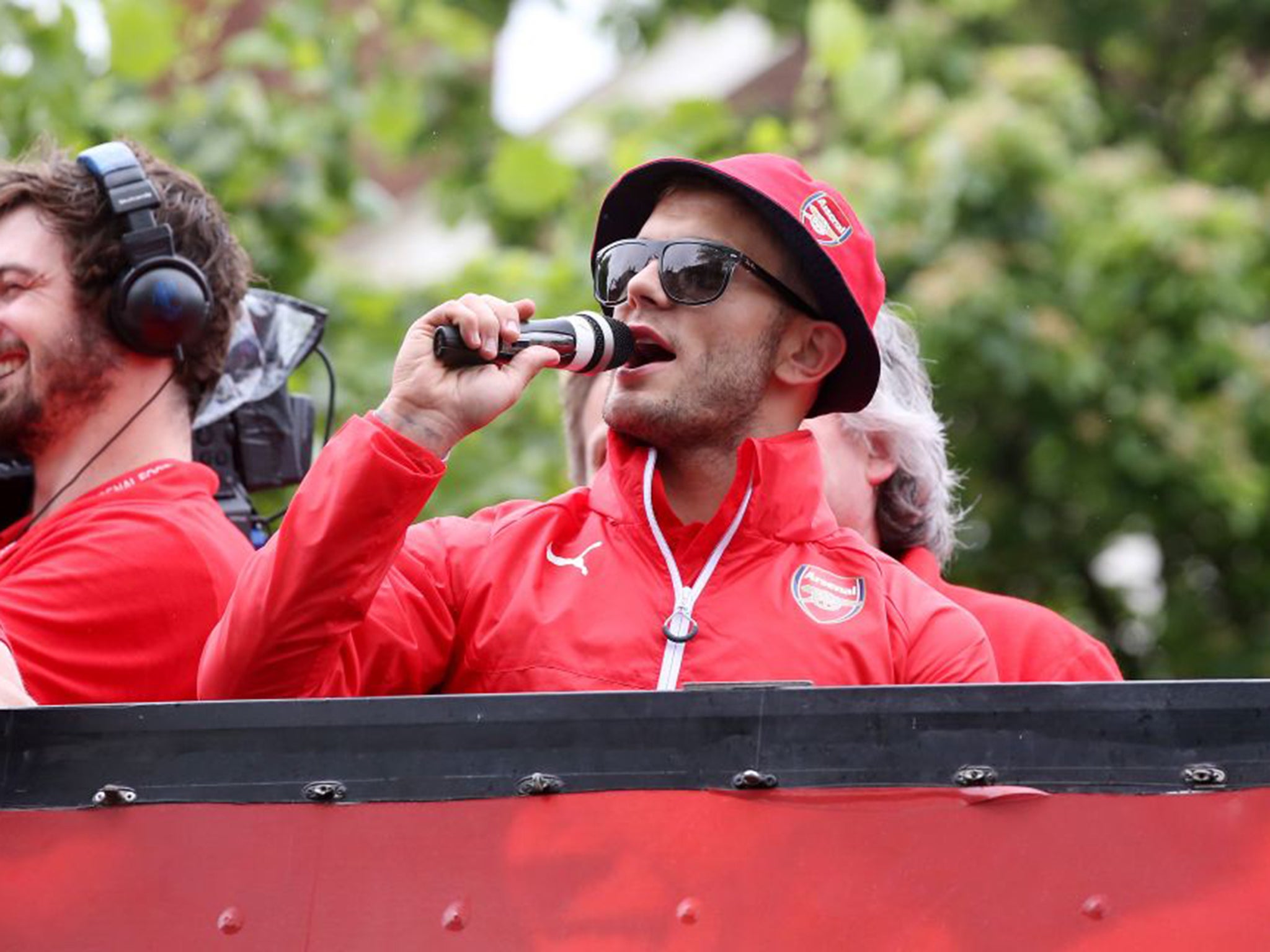 Jack Wilshere leads the chanting at Arsenal’s FA Cup parade