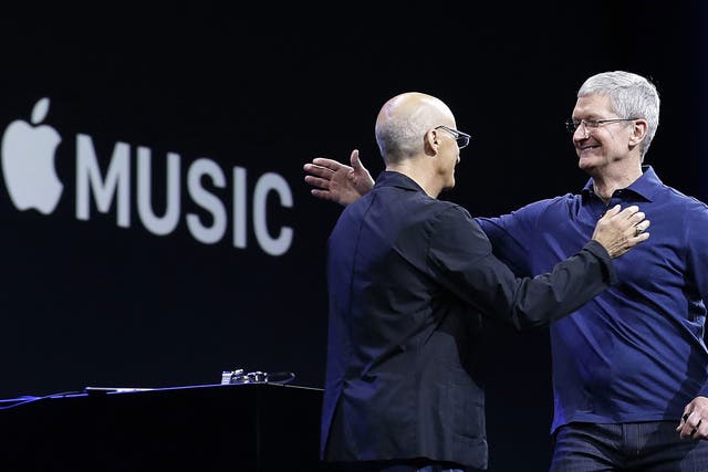 Apple CEO Tim Cook with Beats by Dre co-founder and Apple employee Jimmy Iovine at the Apple Worldwide Developers Conference in San Francisco, Monday, June 8, 2015