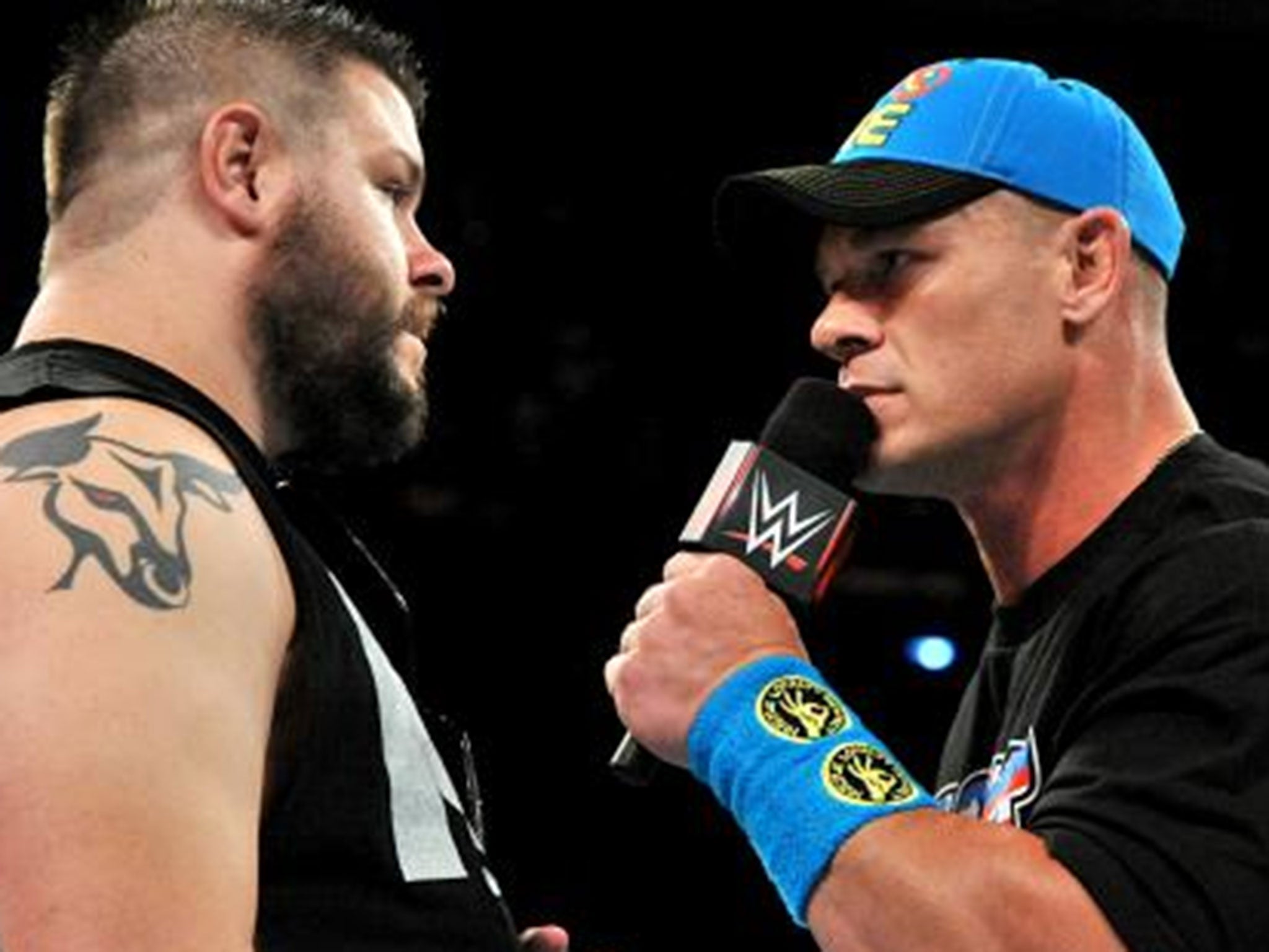 Kevin Owens (left) and John Cena go face-to-face