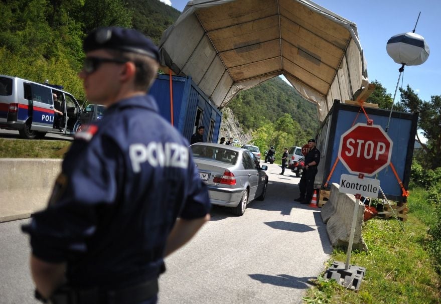 Austrian Police officers check cars near the town of Telfs (Tyrol), Austria, 02 June 2015.