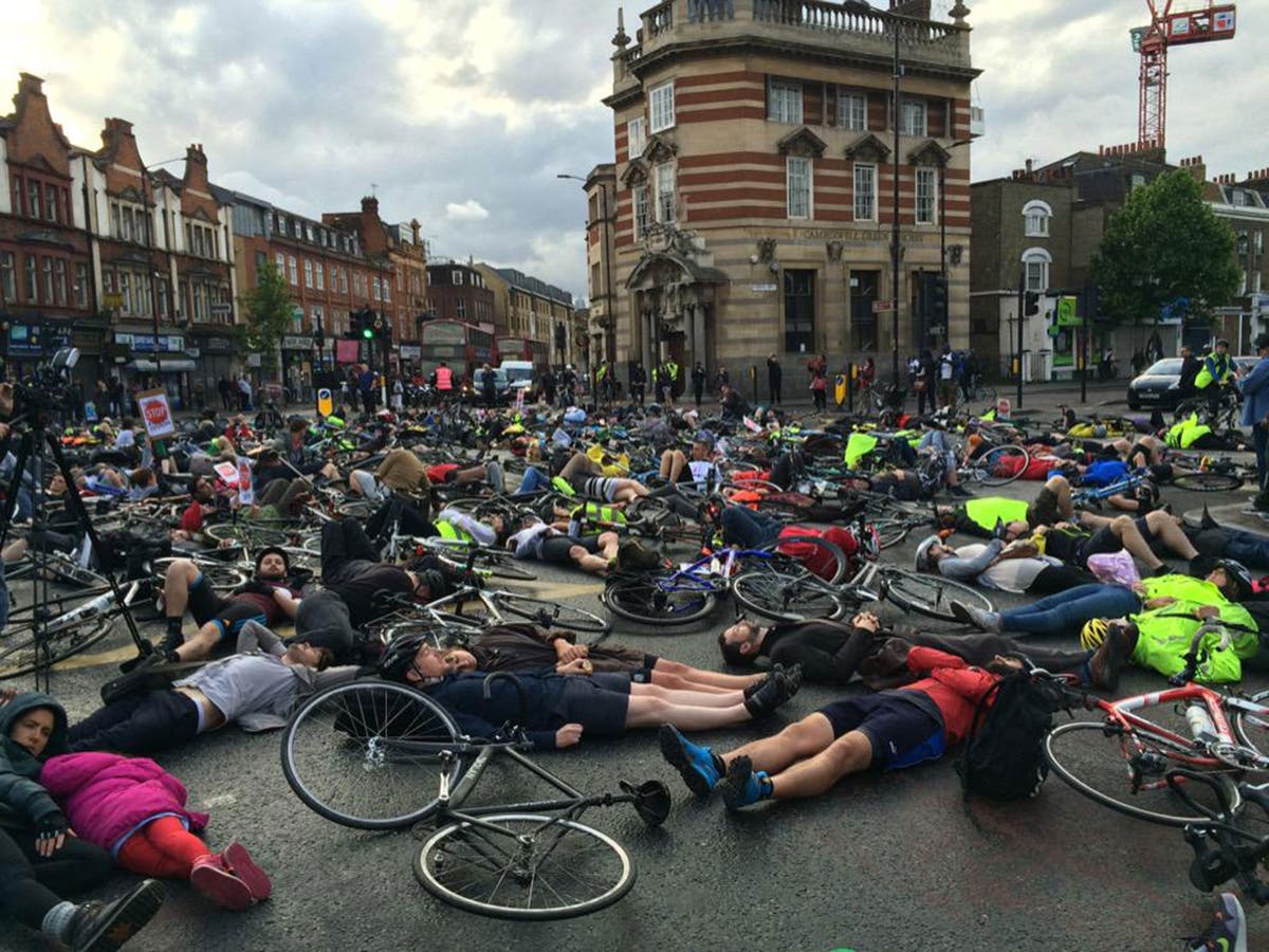 Cyclists stage massive 'diein' for fatal bike crash victim in