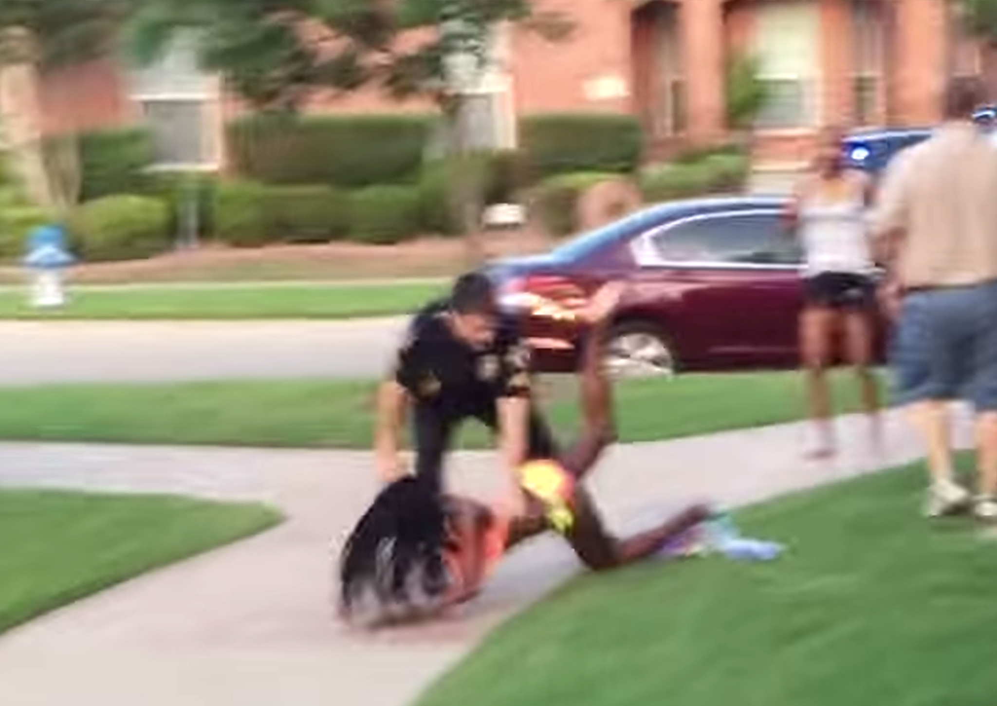 Eric Casebolt throws 15-year-old Dajerria Becton to the floor outside a pool party she had been attending with her friends