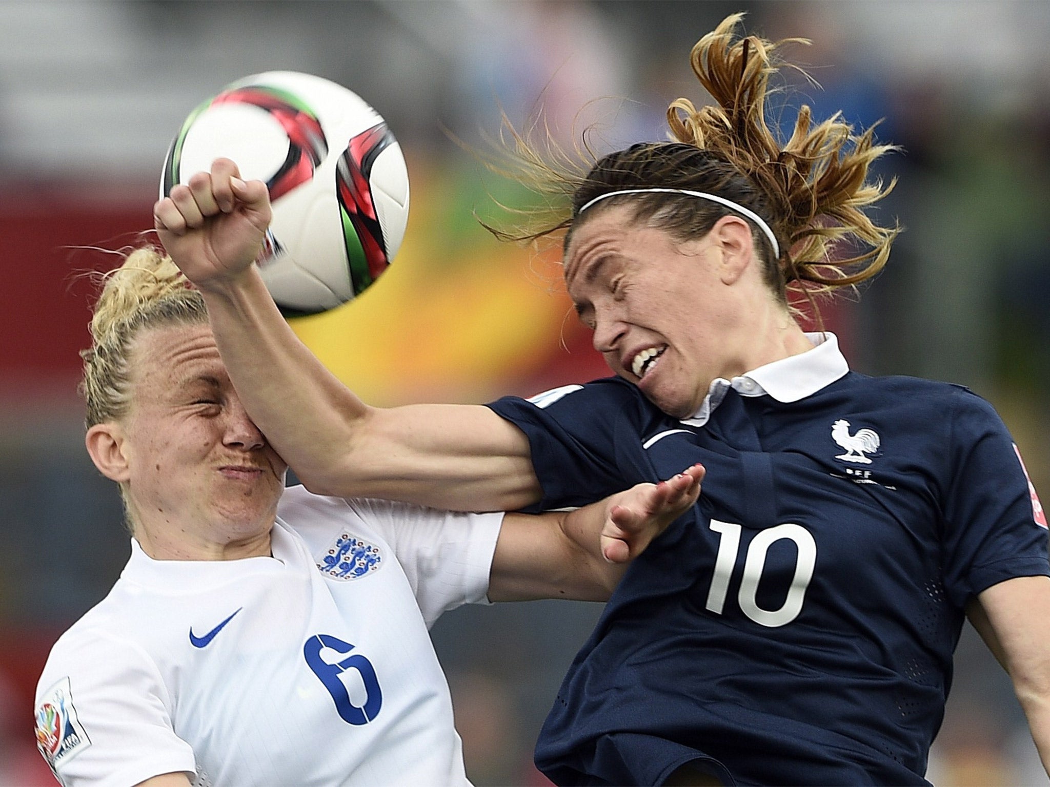 England's defender Laura Bassett vies with France's midfielder Camille Abily (Getty)