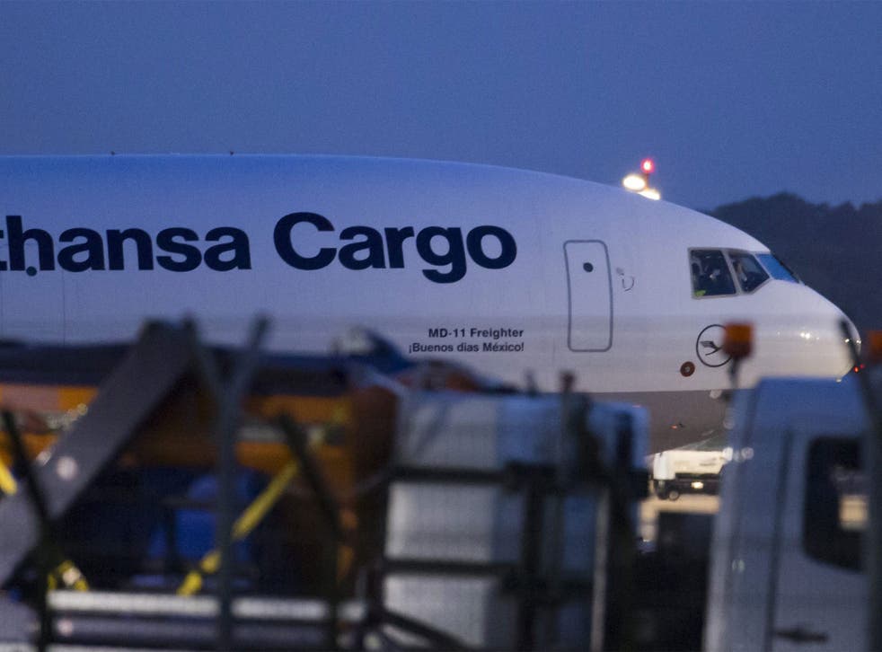 The Lufthansa cargo plane carrying the remains of 44 victims of the Germanwings crash lands in Dusseldorf, Germany