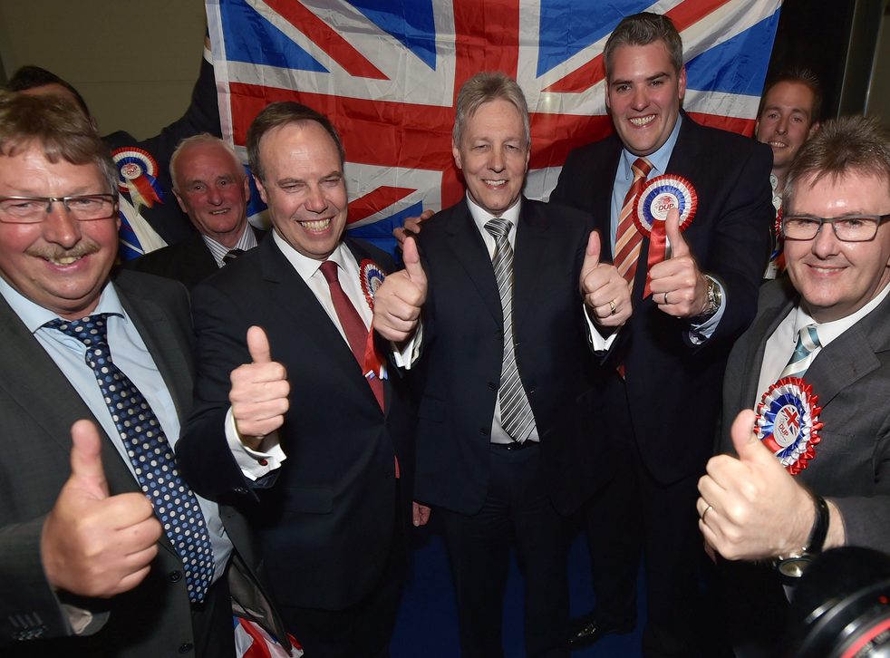 Members of the DUP celebrate their win in this year's election