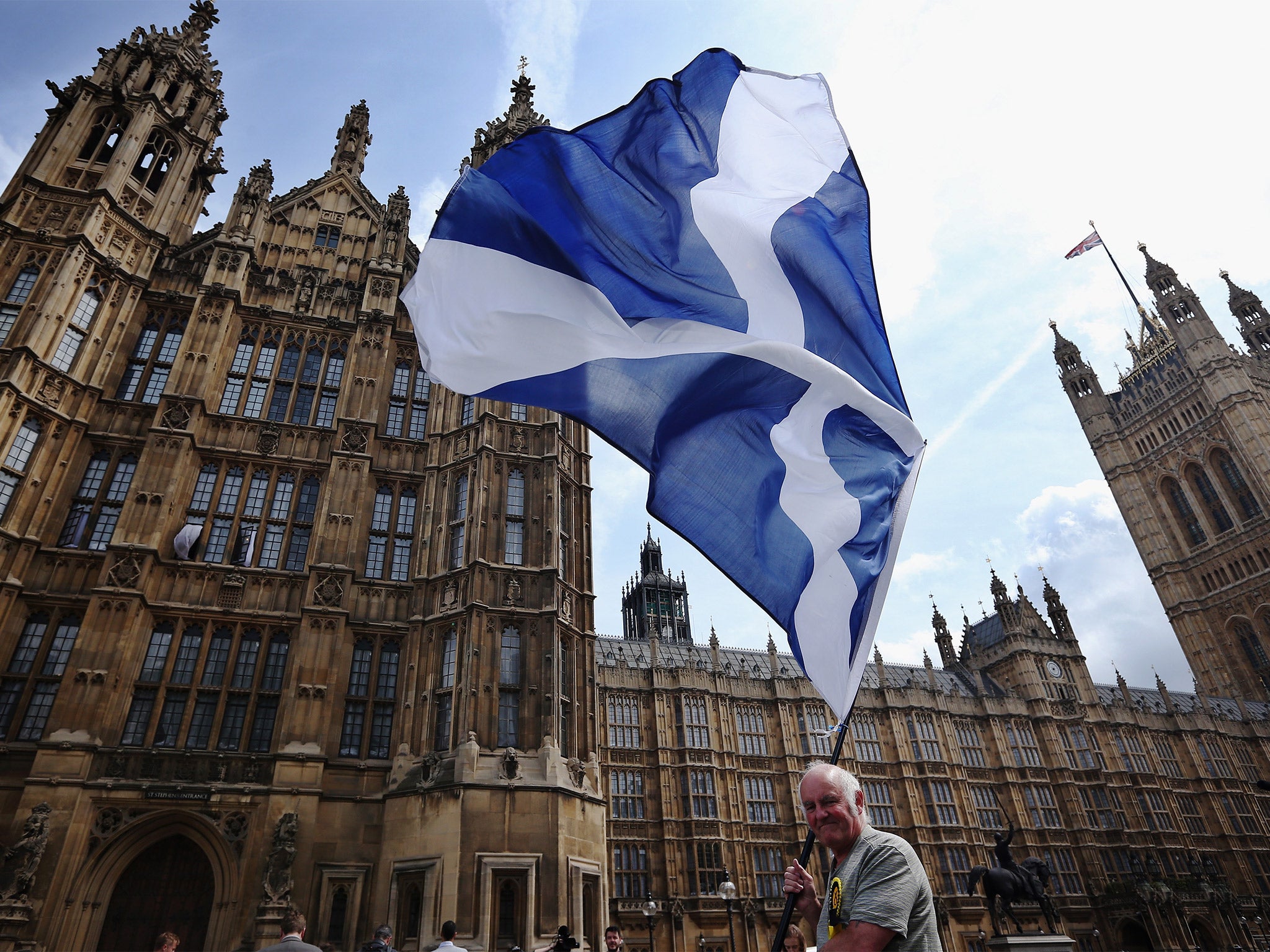 An Scottish nationalist outside the Houses of Parliament, where First Minister of Scotland and SNP leader Nicola Sturgeon joined newly elected SNP MPs for a photocall in May