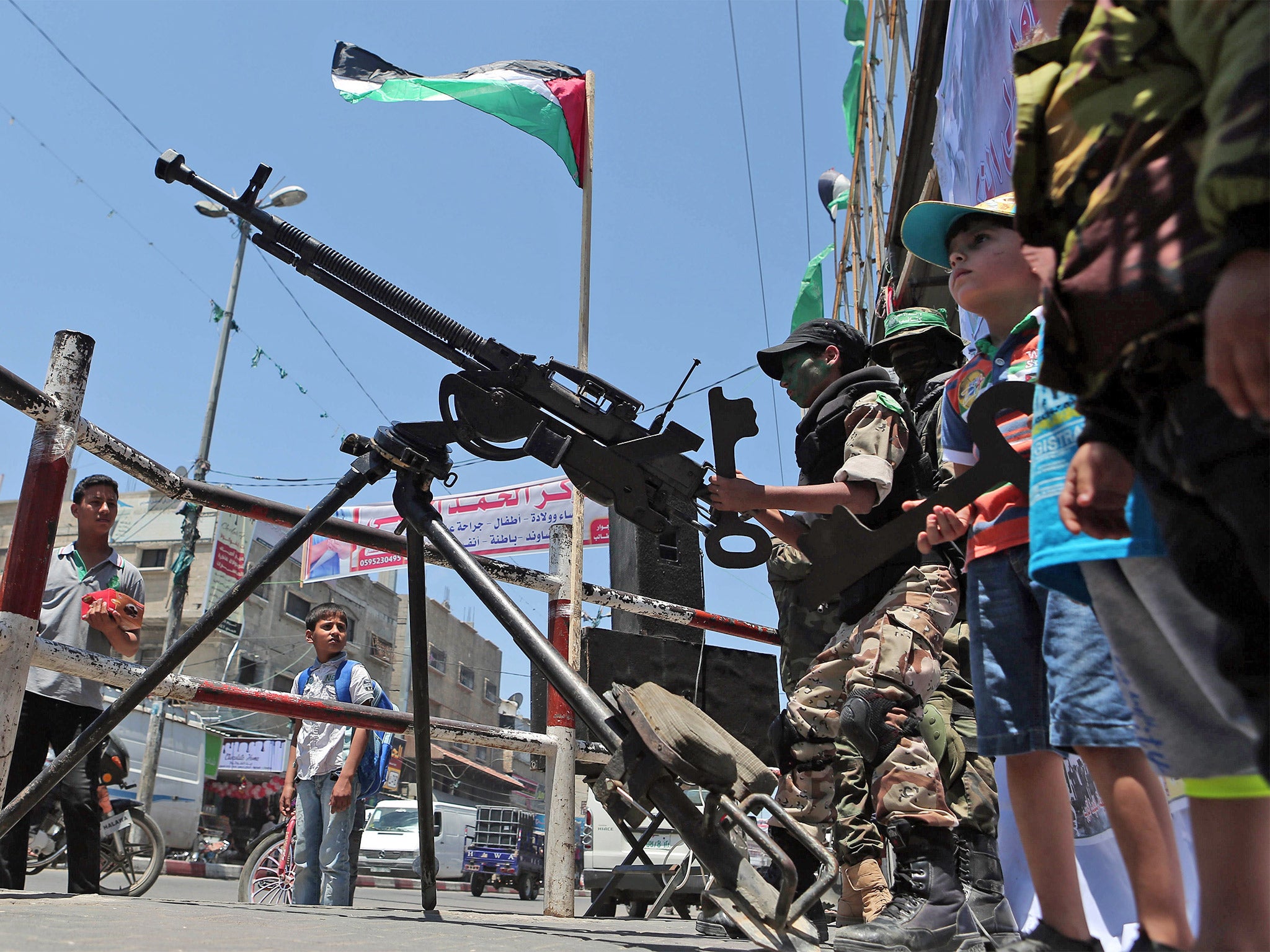 Hamas militants take part in a parade in the southern Gaza Strip town of Rafah, last month (Getty)