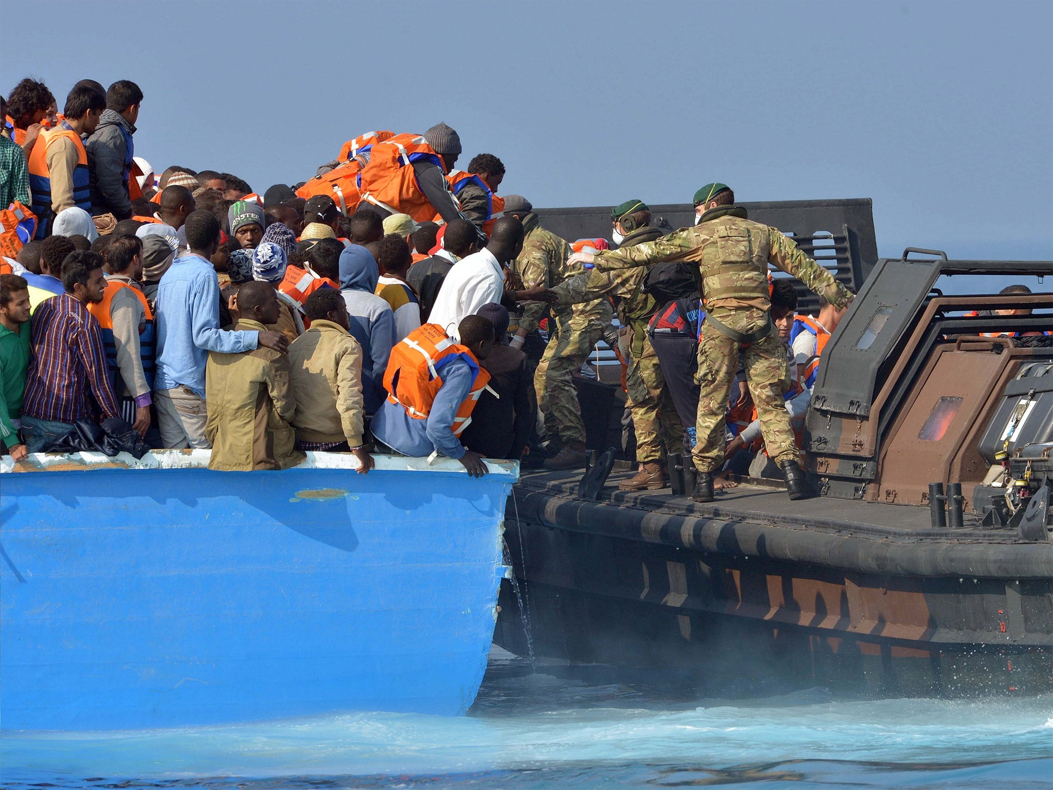 Royal Marines from HMS 'Bulwark' rescue migrants off the coast of Libya