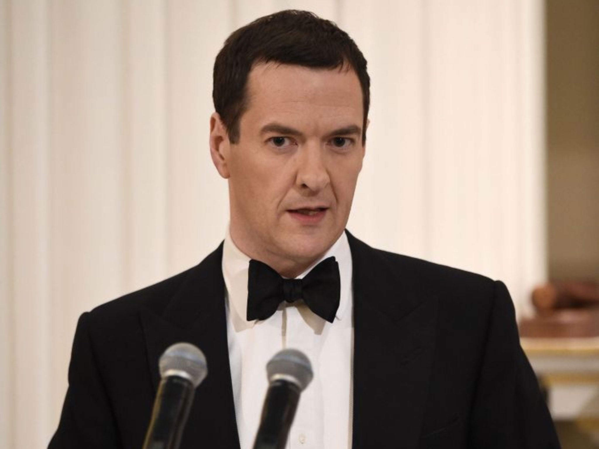 British Chancellor of the Exchequer George Osborne speaks during the Lord Mayor's Dinner to the Bankers and Merchants of the City of London at The Mansion House in London on June 10, 2015. 