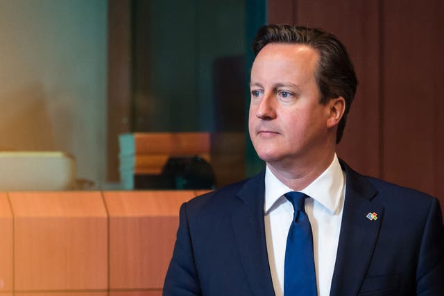 British Prime Minister David Cameron arrives for a round table in Brussels earlier this month