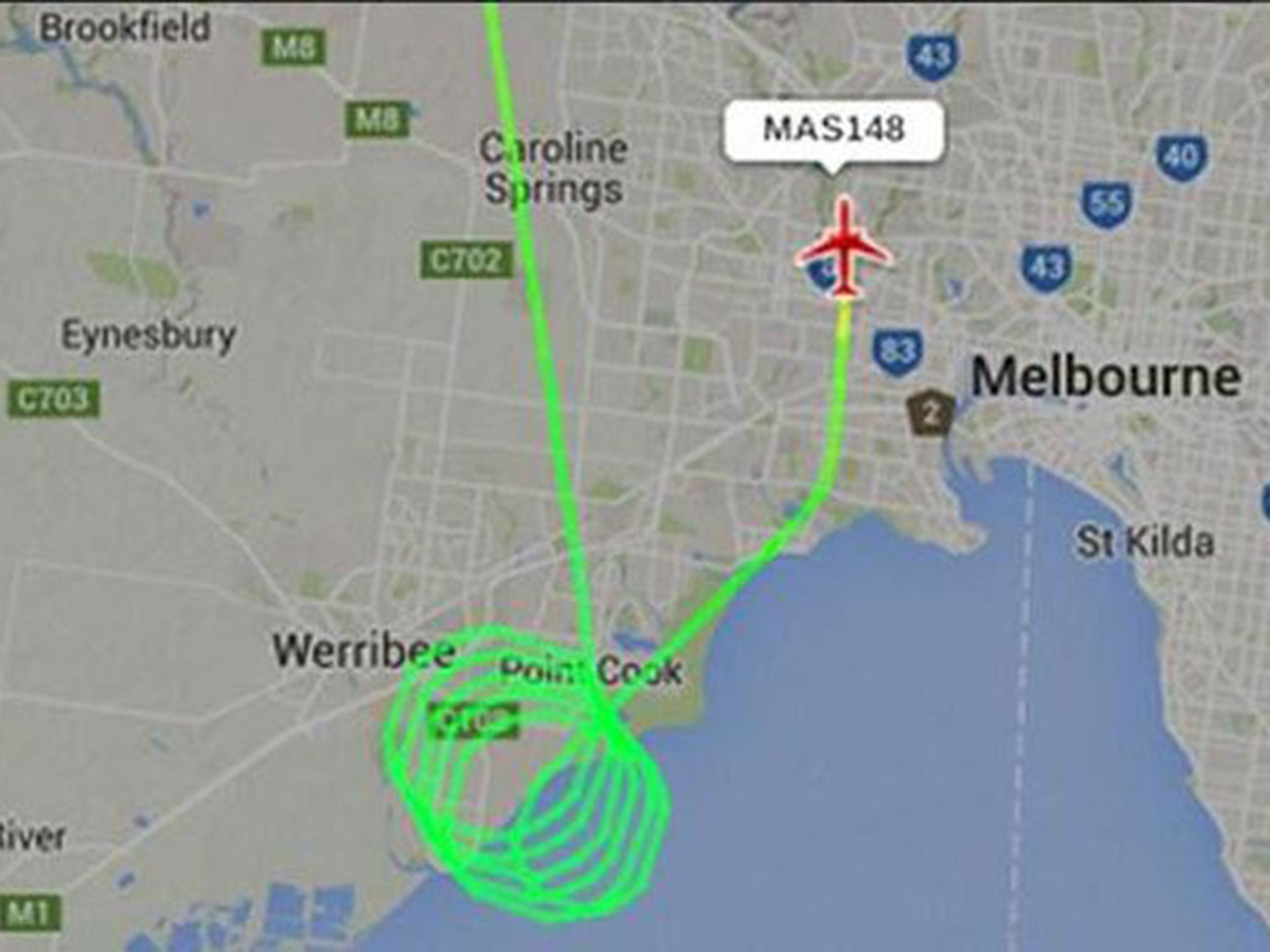 An app tracking the path of Malaysia Airlines flight MA148 shows it returning to Melbourne Airport (credit: Twitter)