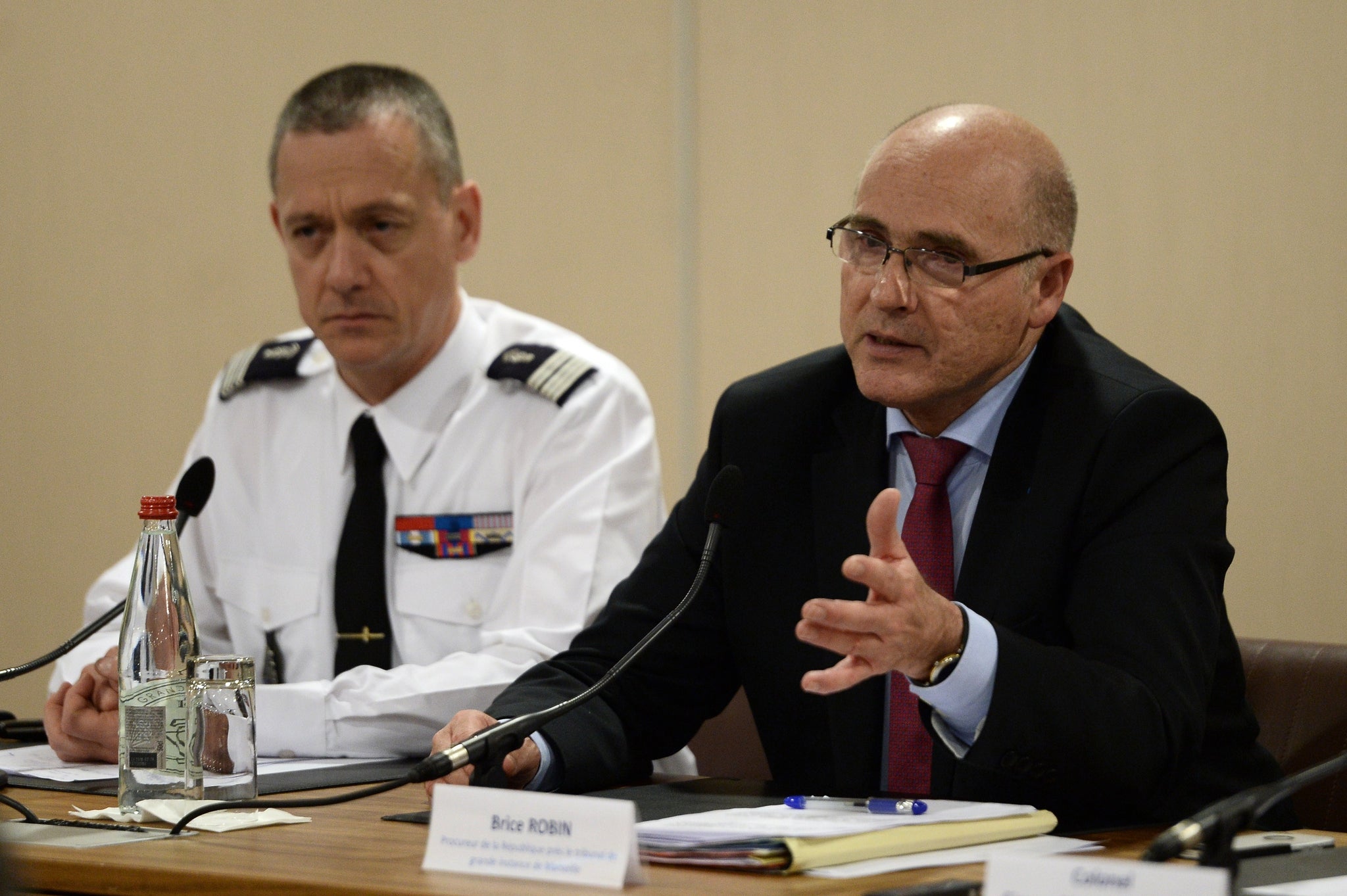 Police Colonel Francois Daoust (left) and prosecutor Brice Robin during the press conference where they announced the beginning of the criminal investigation.