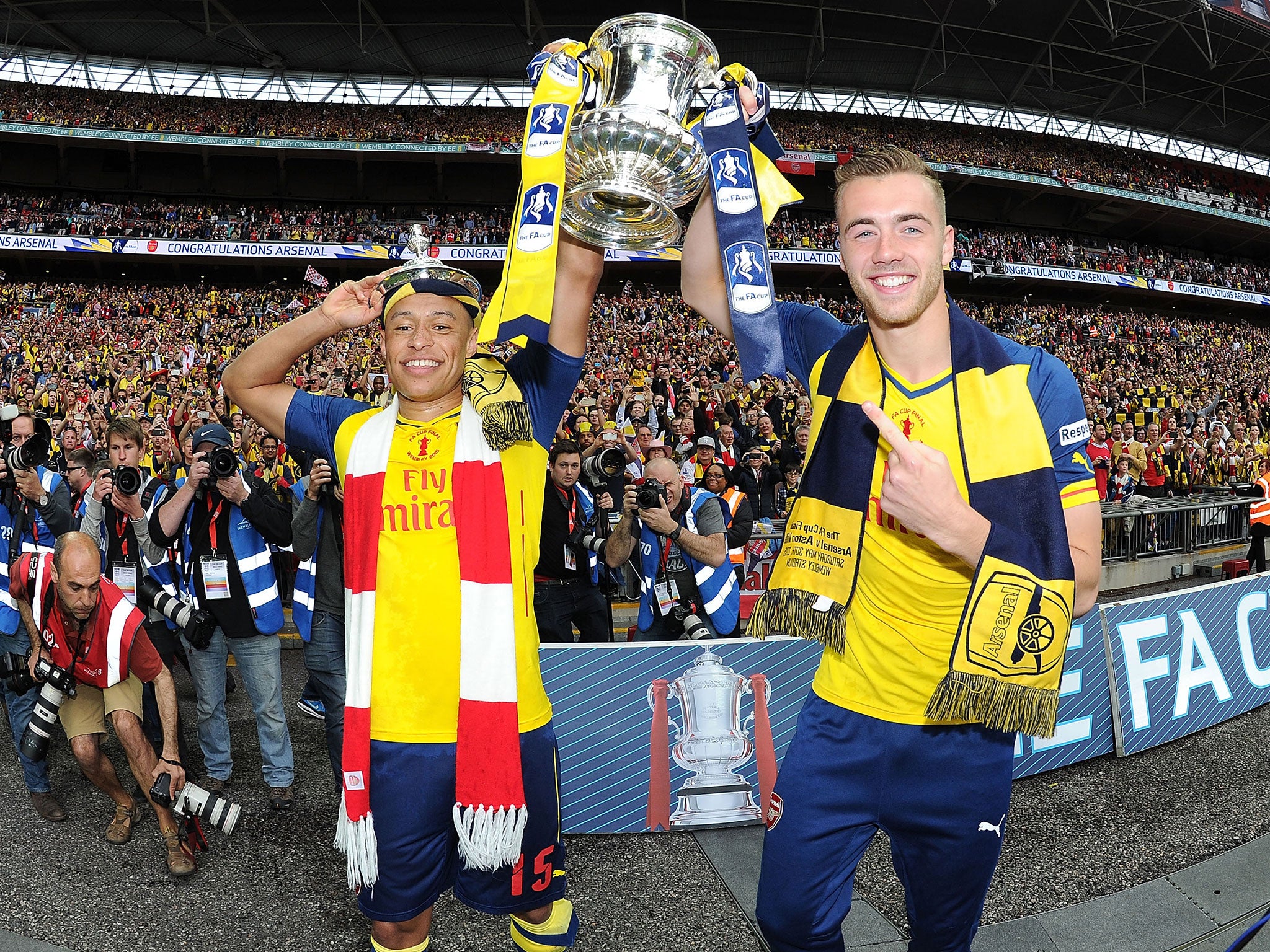 Alex Oxlade-Chamberlain and Chambers lift the FA Cup