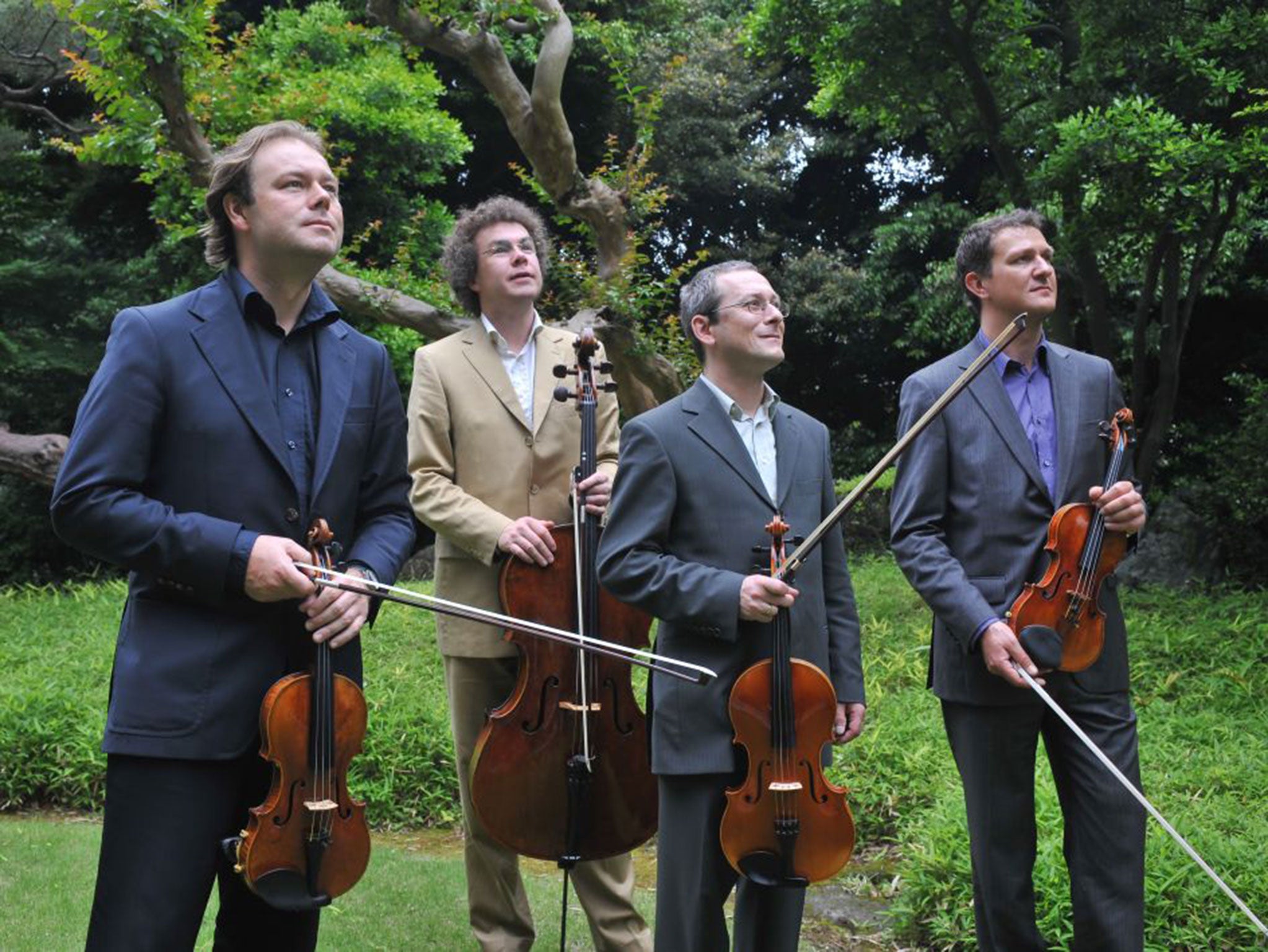Stefan Arzberger (far right), of the Leipzig String Quartet, claims he was poisoned by a transsexual prostitute in New York