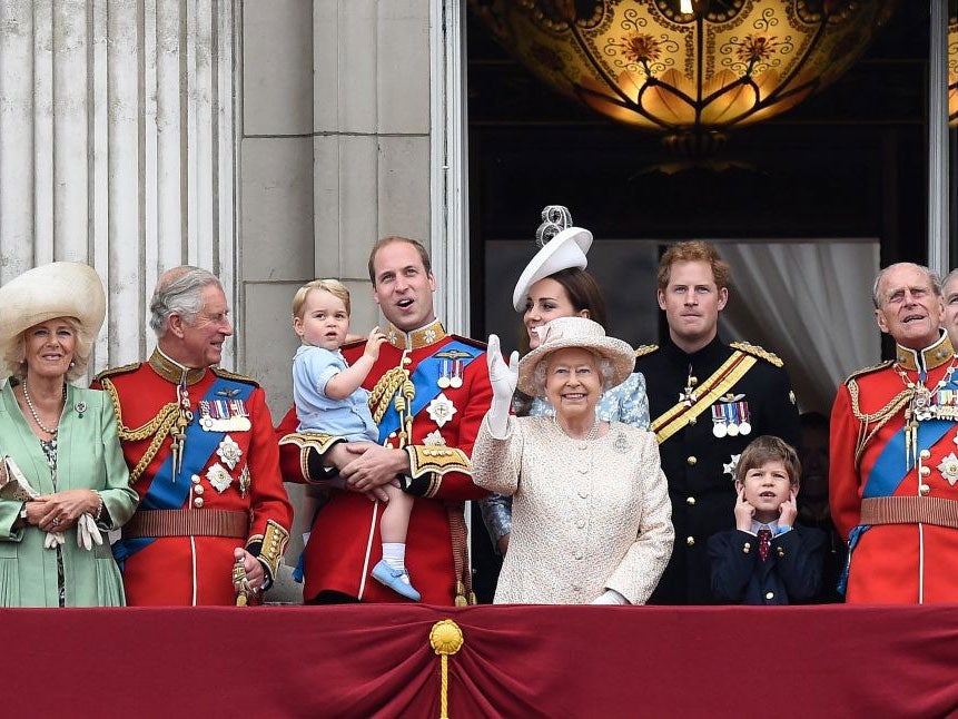The Royal family look on from Buckingham Palace after the Trooping the Colour parade