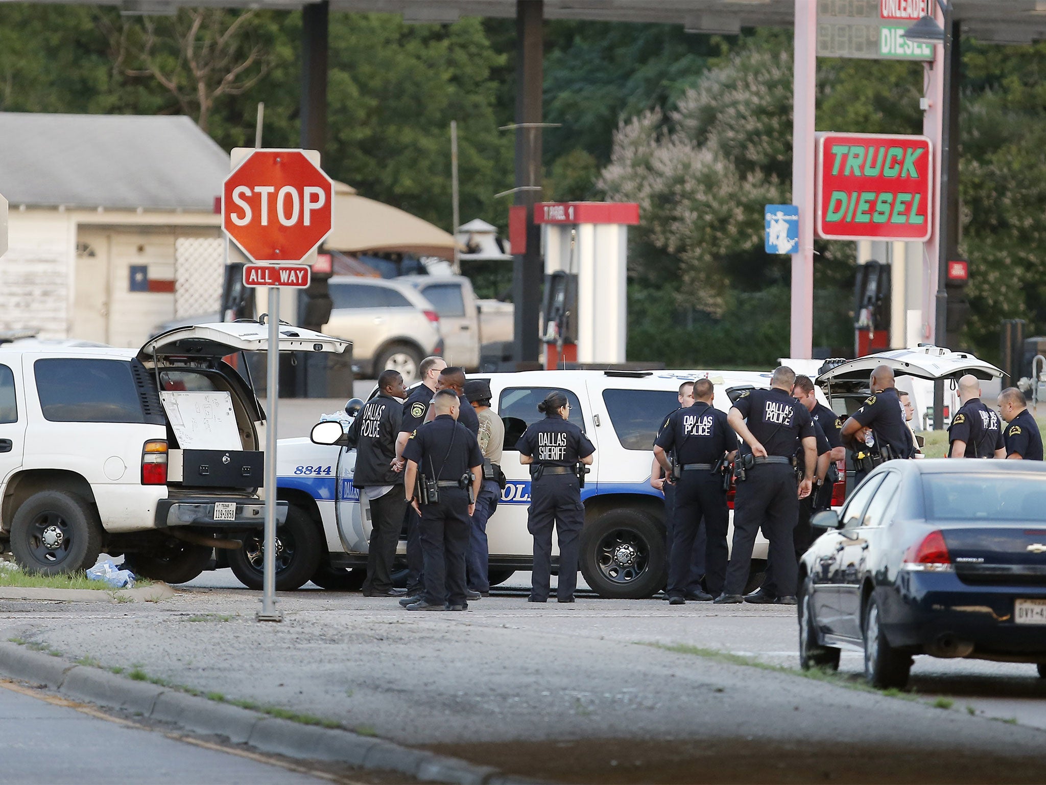 Police block the road following the police chase in southern Dallas