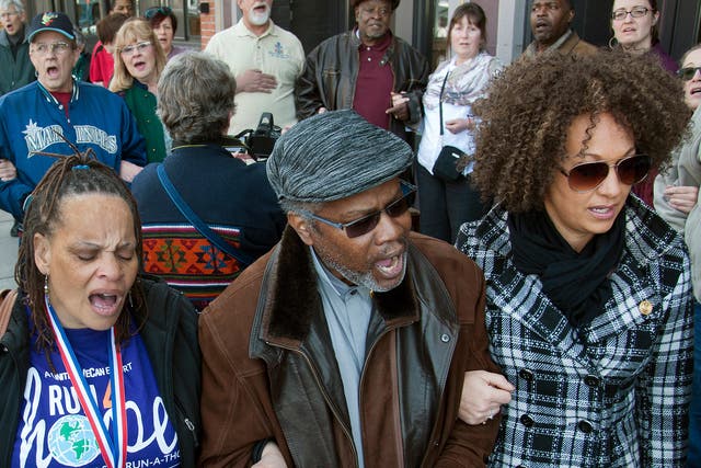 Rachel Dolezal (far right) on a march against racism with friends before she was 'outed'
