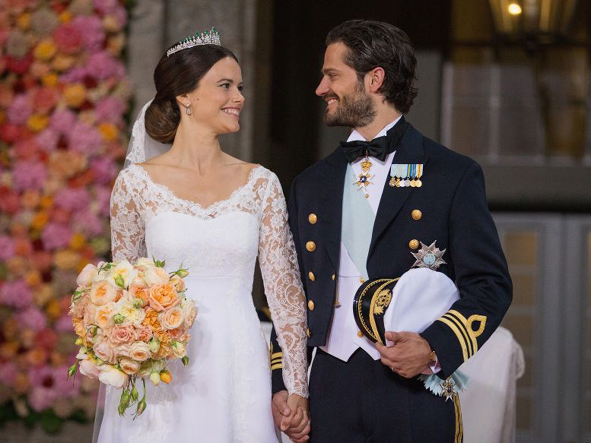 Prince Carl Philip of Sweden with his new wife Princess Sofia of Sweden after their marriage ceremony at The Royal Palace in Stockholm
