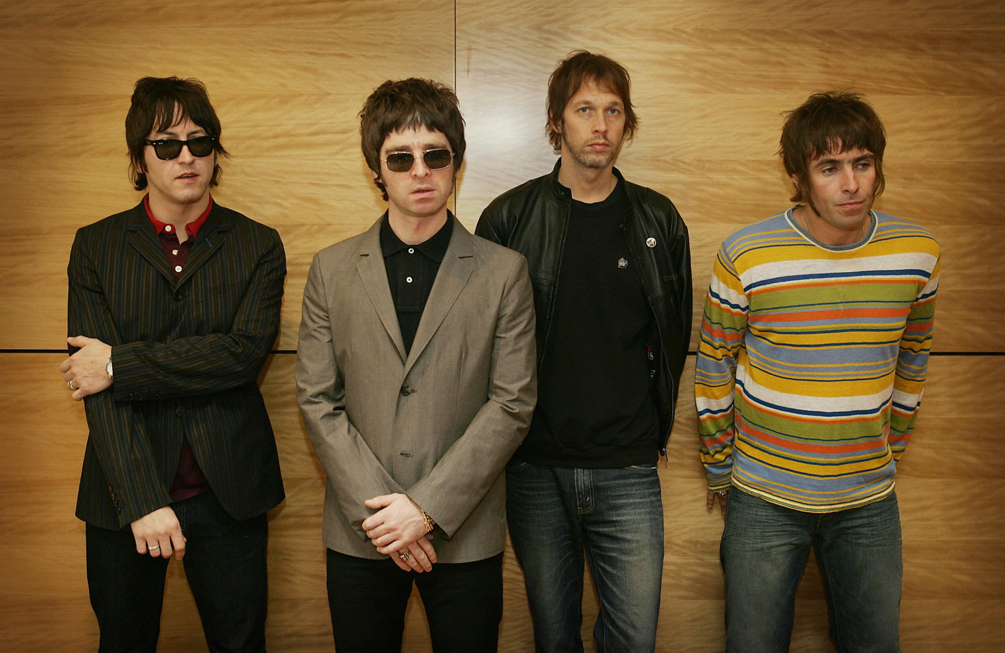 Gem, Noel Gallagher, Andy Bell and Liam Gallagher hold a photocall in Hong Kong on February 25, 2006