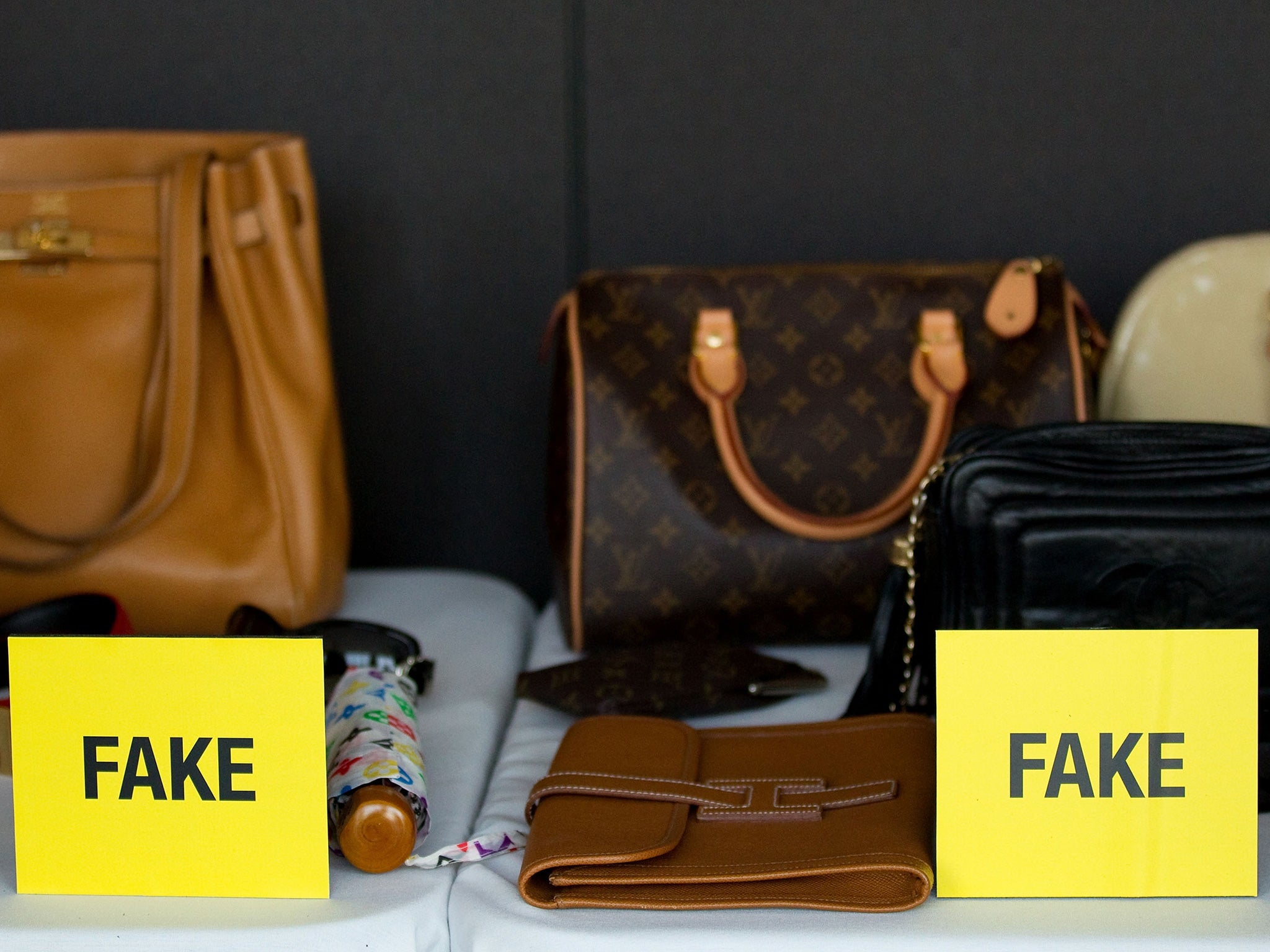 Counterfeit Louis Vuitton and Hermes handbags