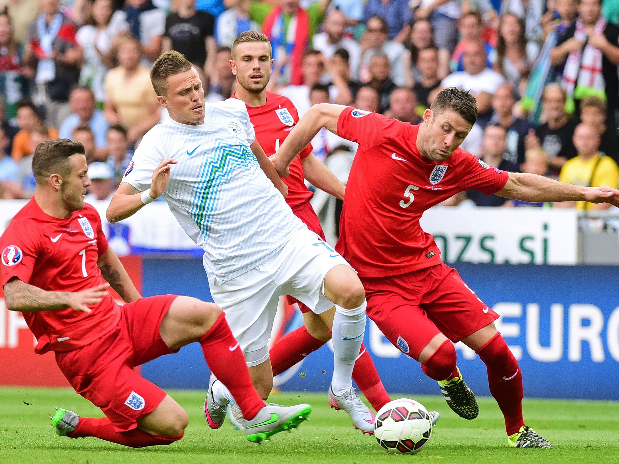 Gary Cahill (right) in action for England against Slovenia