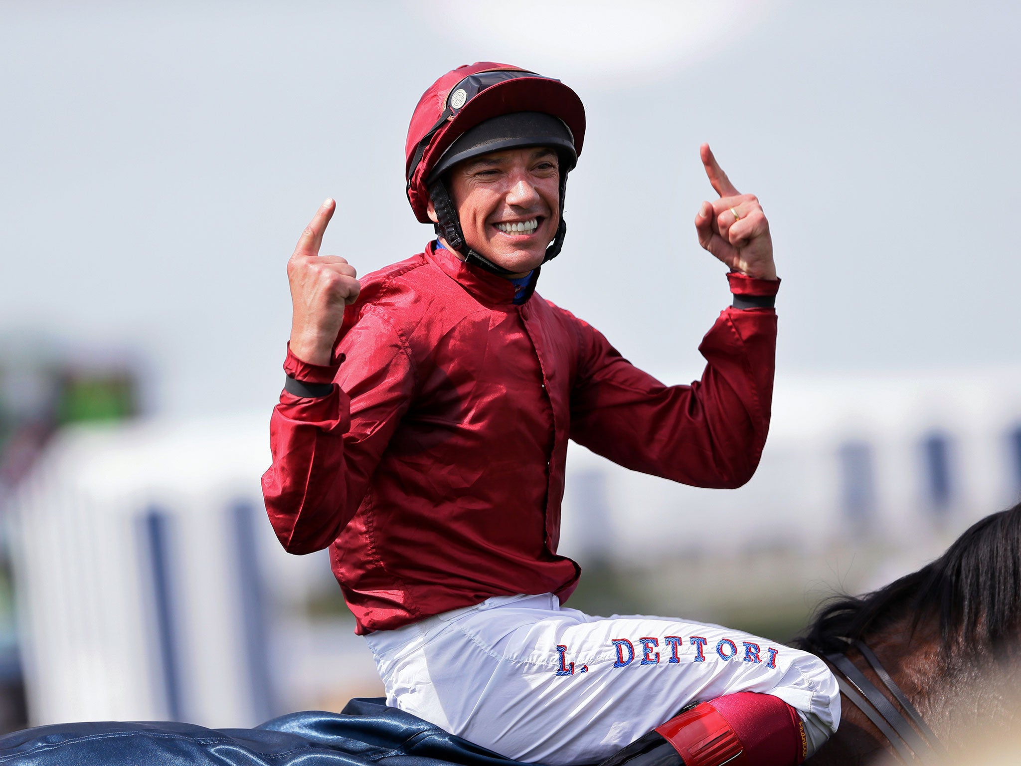Frankie Dettori on Star of Seville celebrates after he won the Prix de Diane horse race