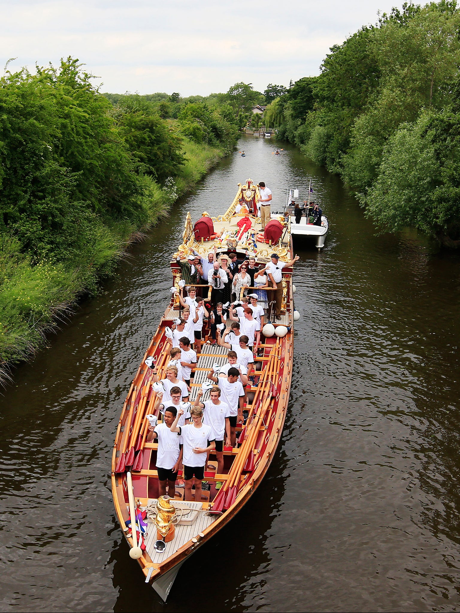 The Royal Barge ‘Gloriana’ passing through Old Windsor Lock on the Thames to mark the 800th anniversary of the sealing of Magna Carta