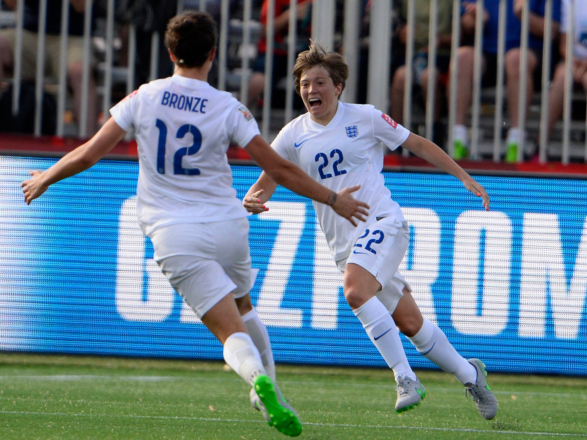 An exultant Fran Kirby wheels away in celebration after scoring England’s opening goal
