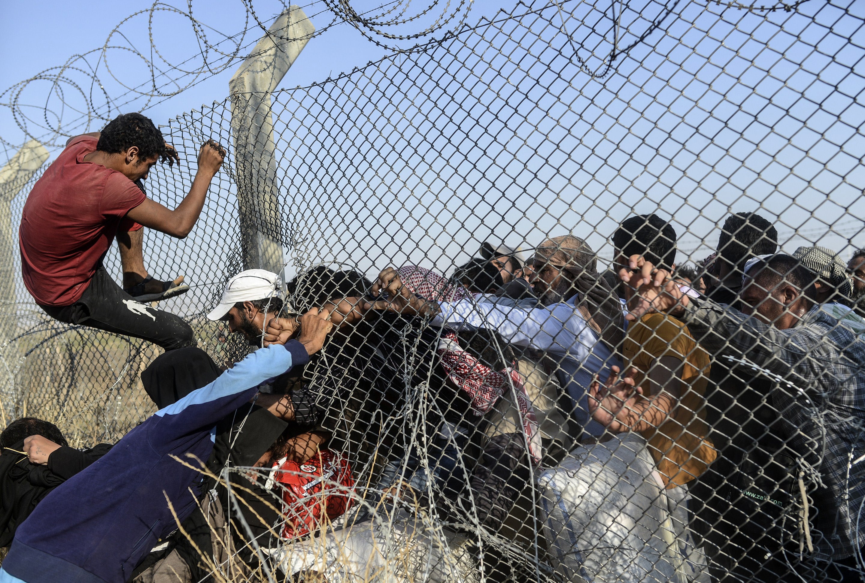 Thousands of refugees fled Syria as Isis violence continues (Photo: BULENT KILIC/AFP/Getty Images)