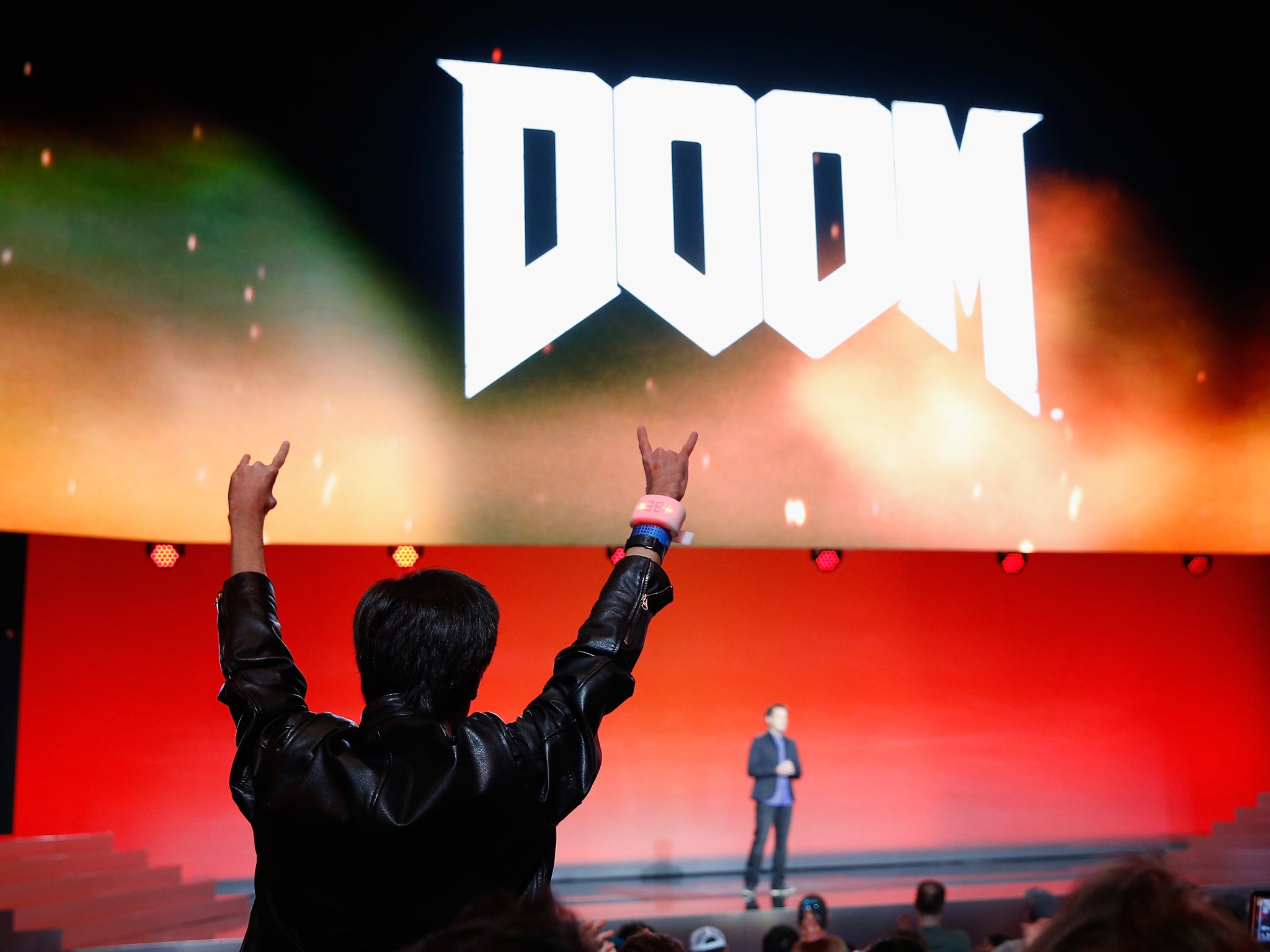 Fans cheer for Executive Producer for Id Software, Marty Stratton as he speaks about 'Doom' during the Bethesda E3 2015 press conference at the Dolby Theatre on June 14, 2015 in Los Angeles, California