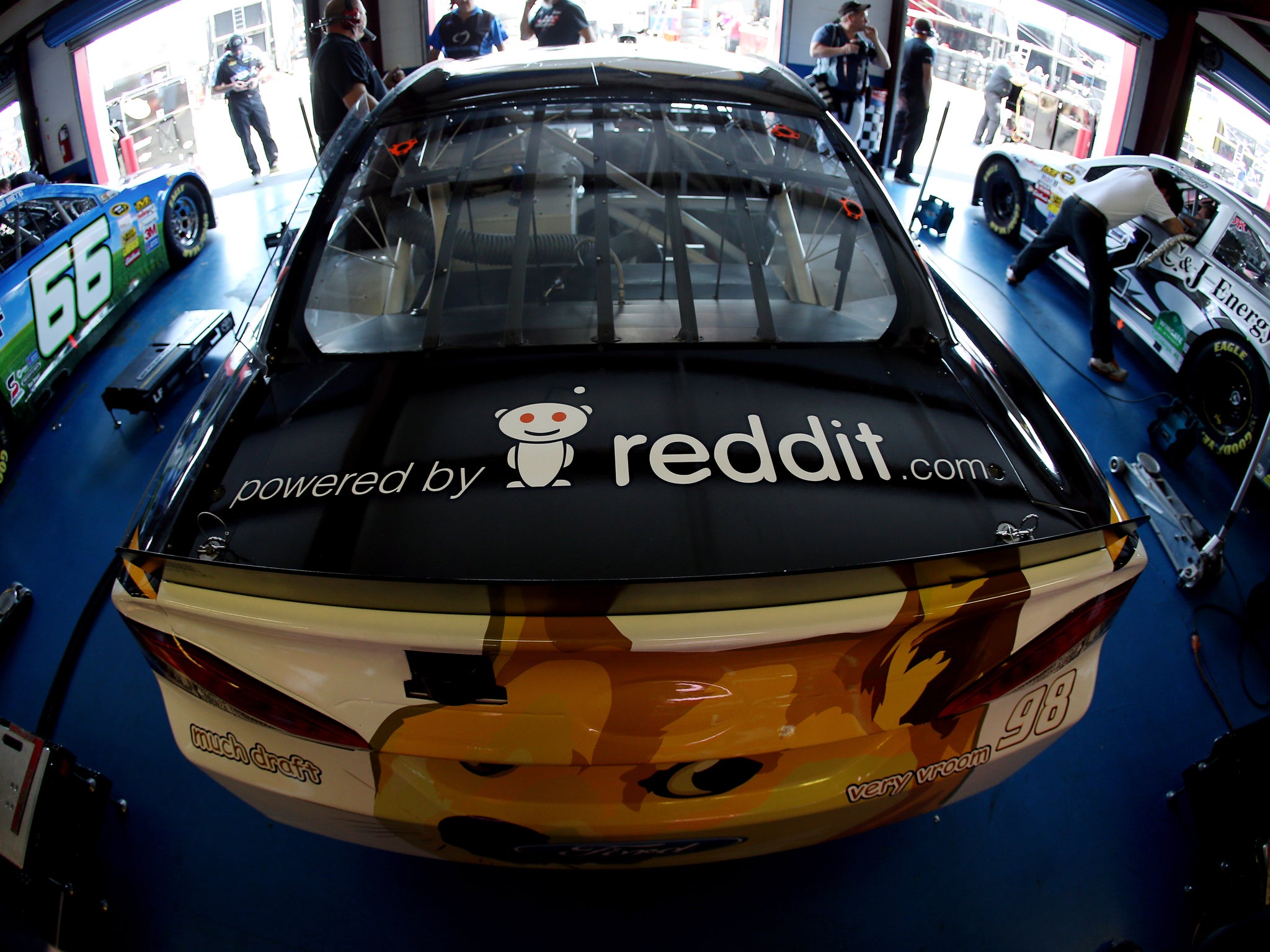 The #98 Dogecoin / Reddit.com Ford, driven by Josh Wise, is seen in the garage during practice for the NASCAR Sprint Cup Series Aaron's 499 at Talladega Superspeedway on May 2, 2014 in Talladega, Alabama
